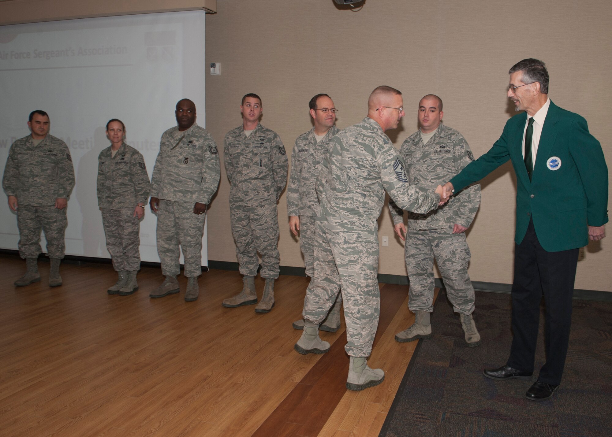 U.S Air Force Chief Master Sgt. Michael Goetz, 93d Air Ground Operations Wing command chief, shakes hands with the newly inducted council members of Air Force Sergeants Association (AFSA) Chapter 460 at Moody Air Force Base, Ga., Jan. 8, 2014. Goetz was asked to be a guest speaker for the first meeting of 2014 to speak about the importance of the AFSA initiatives. (U.S. Air Force photo by Senior Airman Eileen Meier/Released)