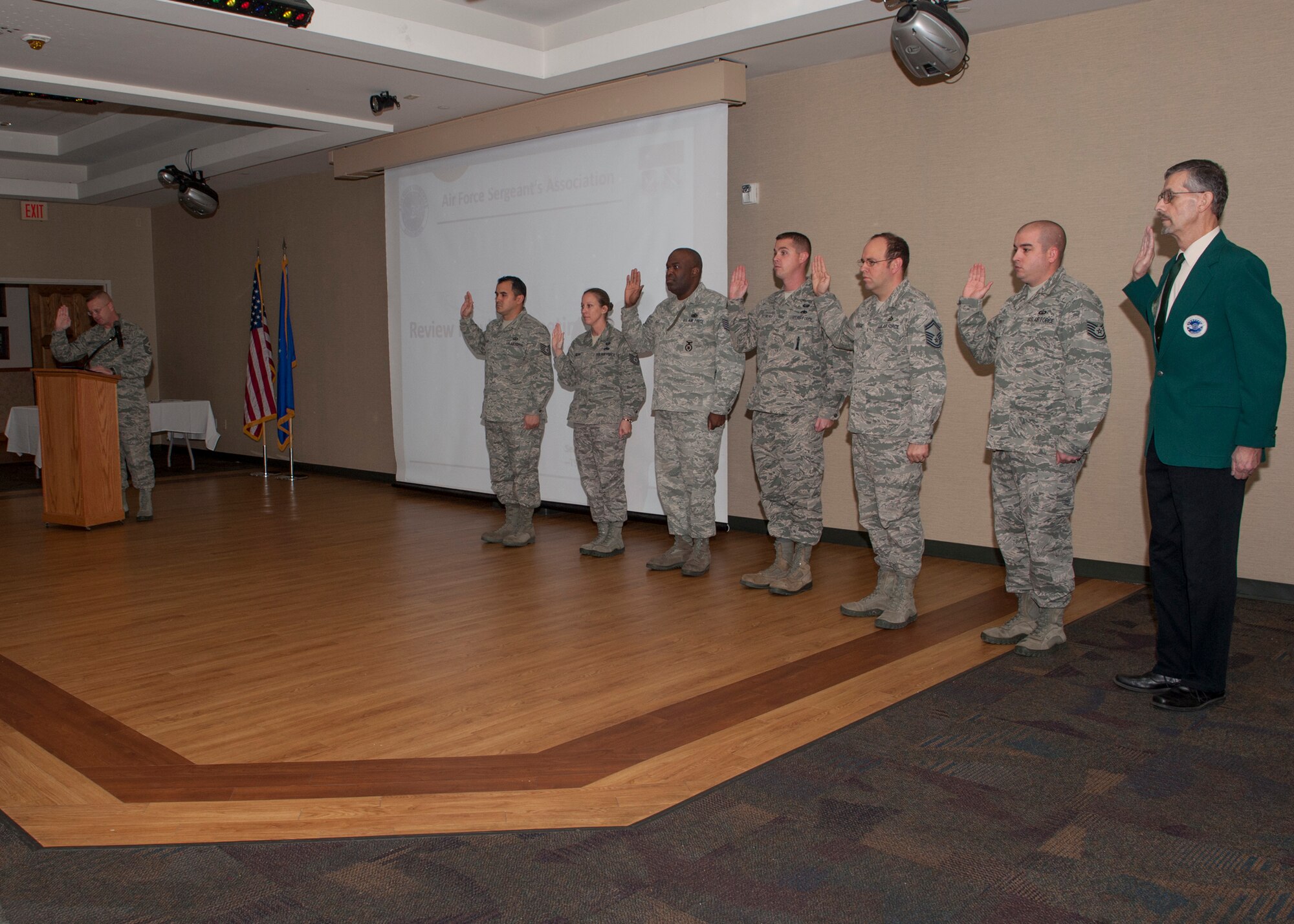 New council members of the Air Force Sergeants Association (AFSA) Chapter 460 are inducted by U.S. Air Force Chief Master Sgt. Michael Goetz, 93d Air Ground Operations Wing command chief, at Moody Air Force Base, Ga., Jan. 8, 2014. This was the first meeting of the year and Goetz was requested to be a guest speaker. (U.S. Air Force photo by Senior Airman Eileen Meier/Released)