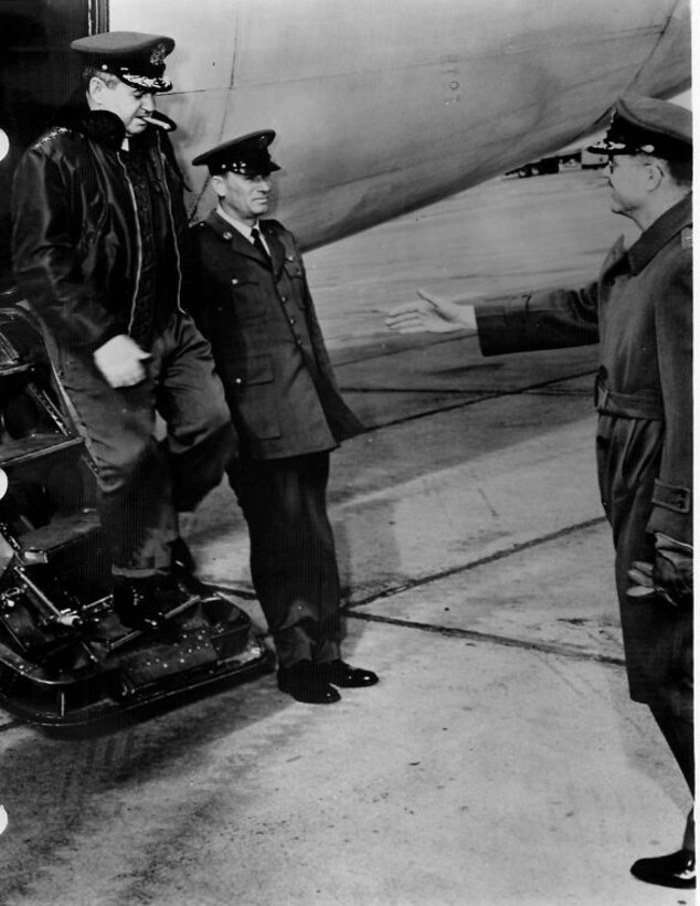 SAC COMMANDER, GENERAL CURTIS E. LeMAY, arrives at Great Falls AFB, Montana, to greet Colonel Lester C. Harris. Colonel Harris is head of the 407th Strategic Fighter Wing which became a 15th AF unit on February 1st. (Strategic Air Command Archives)