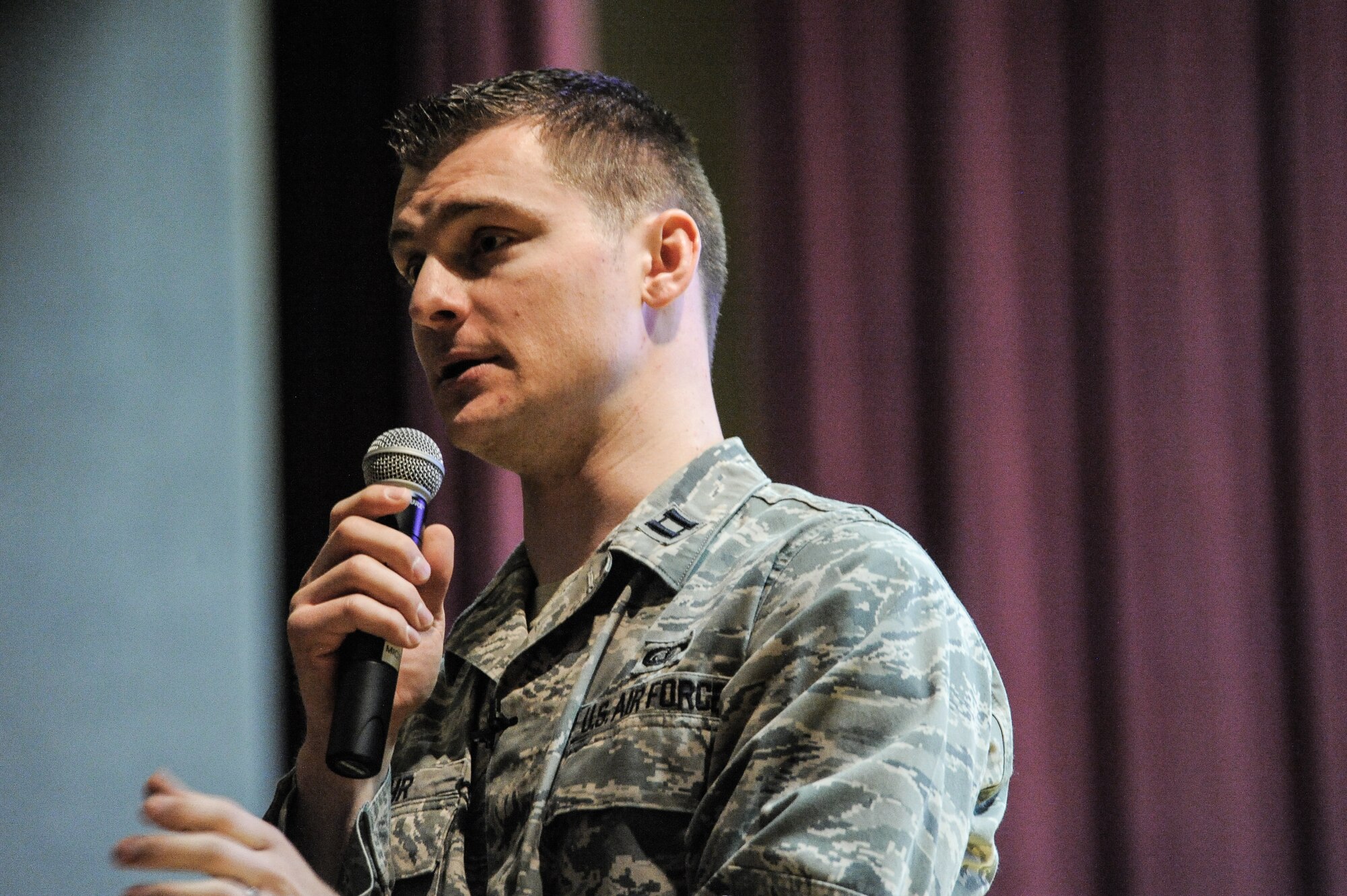 Capt. Carsten Stahr, 92nd Military Personnel Flight commander, opens ups the Enlisted Retention Board brief during a town hall to update and inform selected enlisted members for the retention board at Fairchild Air Force Base, Wash., Jan. 7, 2014. An enlisted retention board will be held in June to consider eligible senior airmen through senior master sergeants for retention in the Air Force. (U.S. Air Force photo by Staff Sgt. Alexandre Montes/RELEASED)