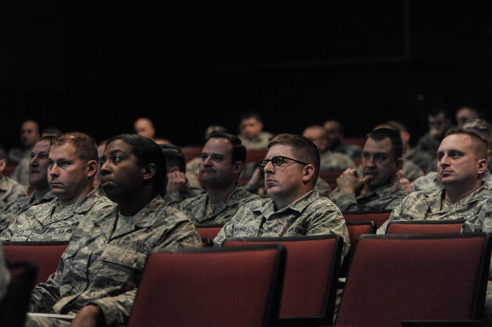 Fairchild Airmen attended town hall briefings to stay informed on the recent announcements of the Air Force Enlisted Retention Boards coming this year at Fairchild Air Force Base, Wash., Jan. 7, 2014. The retention board will review enlisted members records, consisting of enlisted performance reports, decorations and a retention recommendation form to select individuals for continued retention. The board will consider Airmen who are in overmanned Air Force specialties. (U.S. Air Force photo by Staff Sgt. Alexandre Montes/RELEASED)