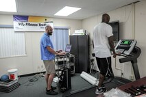 Jonathan Low, Hickam Human Performance and Rehabilitation Center exercise physiologist and personal trainer, uses gait analysis equipment to monitor a patient’s walk at the HPARC on Joint Base Pearl Harbor-Hickam, Hawaii, Jan. 9, 2014. Low uses gait analysis hardware and software to assess, plan and treat individuals with injuries. (U.S. Air Force photo/Tech. Sgt. Terri Paden)