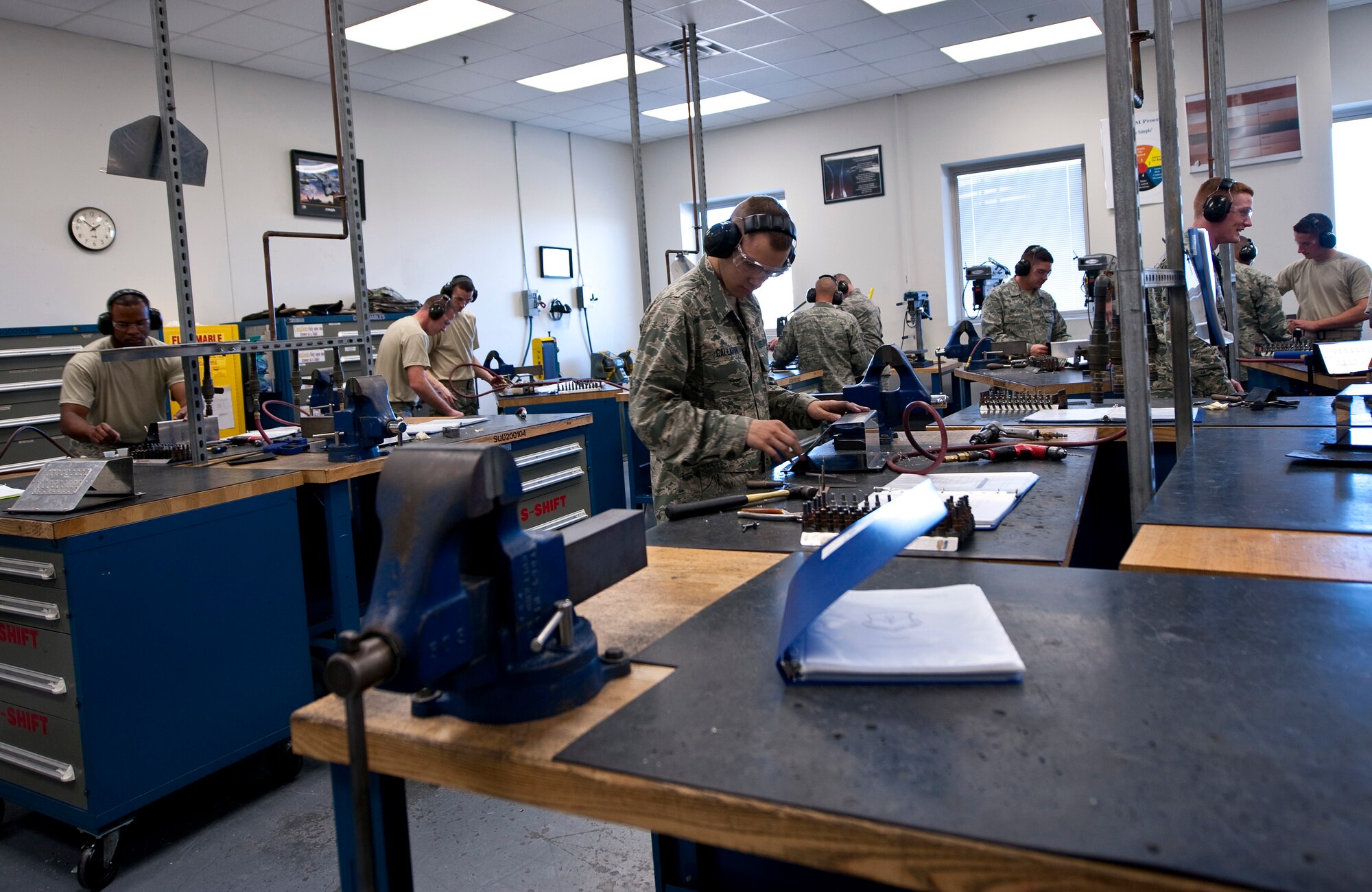 Aircraft structural maintenance students learn repair techniques in a classroom at Detachment 1, 359th Training Squadron at Naval Air Station Pensacola, Fla., Dec. 17, 2013. ASM students take a 17-week course to prepare them to repair aircraft at their duty assignments. (U.S. Air Force photo/Senior Airman Michelle Vickers)    

 