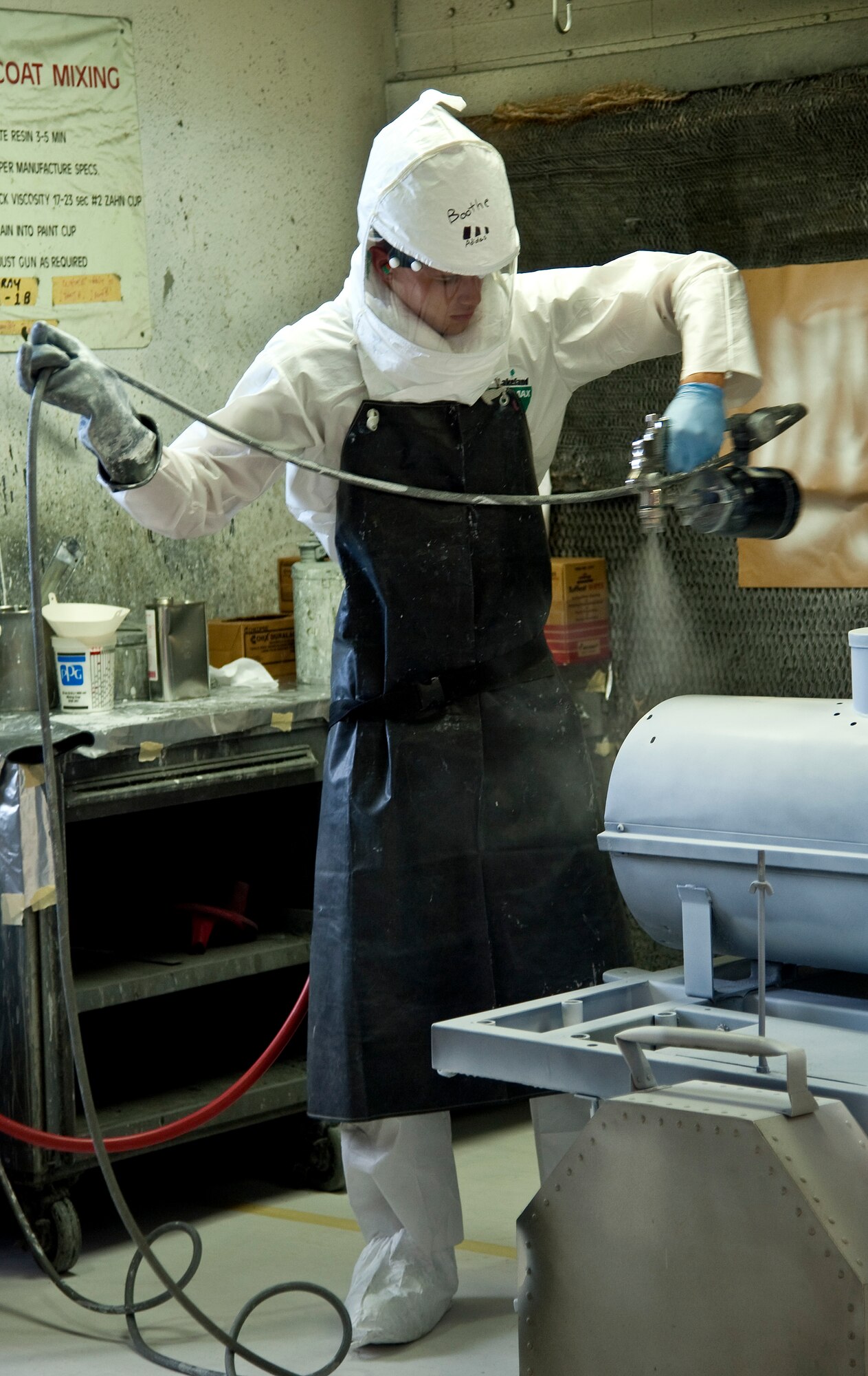 A Detachment 1, 359th Training Squadron low observable aircraft structural maintenance student paints an aircraft component at Naval Air Station Pensacola, Fla., Dec. 17, 2013. Painting aircraft is important to prevent corrosion of the metal. (U.S. Air Force photo/Senior Airman Michelle Vickers)  

 
