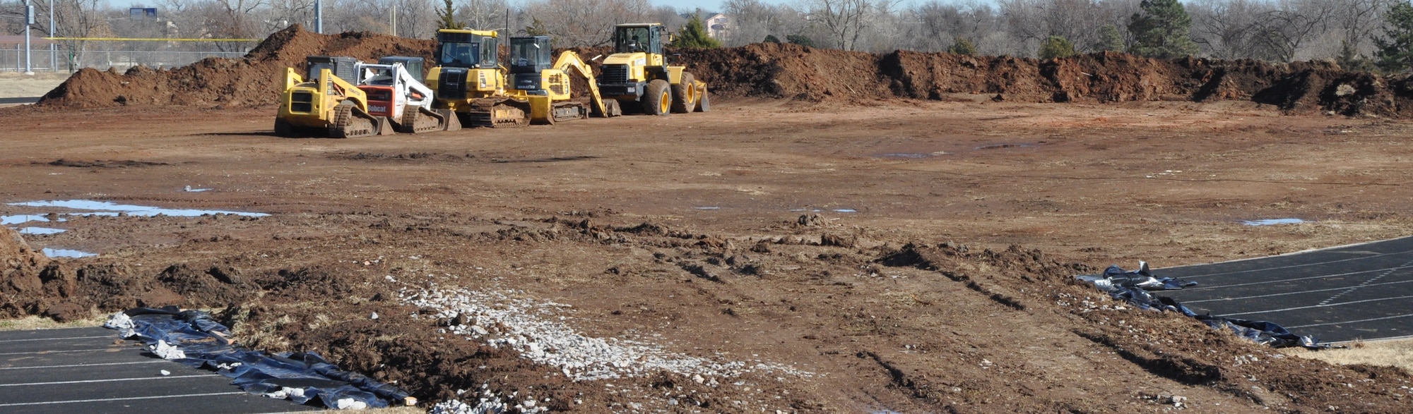 Preparations are under way for the installation of 101,000 square feet of artificial turf at Tinker’s football/soccer field. The installation is expected to begin Jan. 20 and should take one month to complete. (Air Force photo by Mike W. Ray)