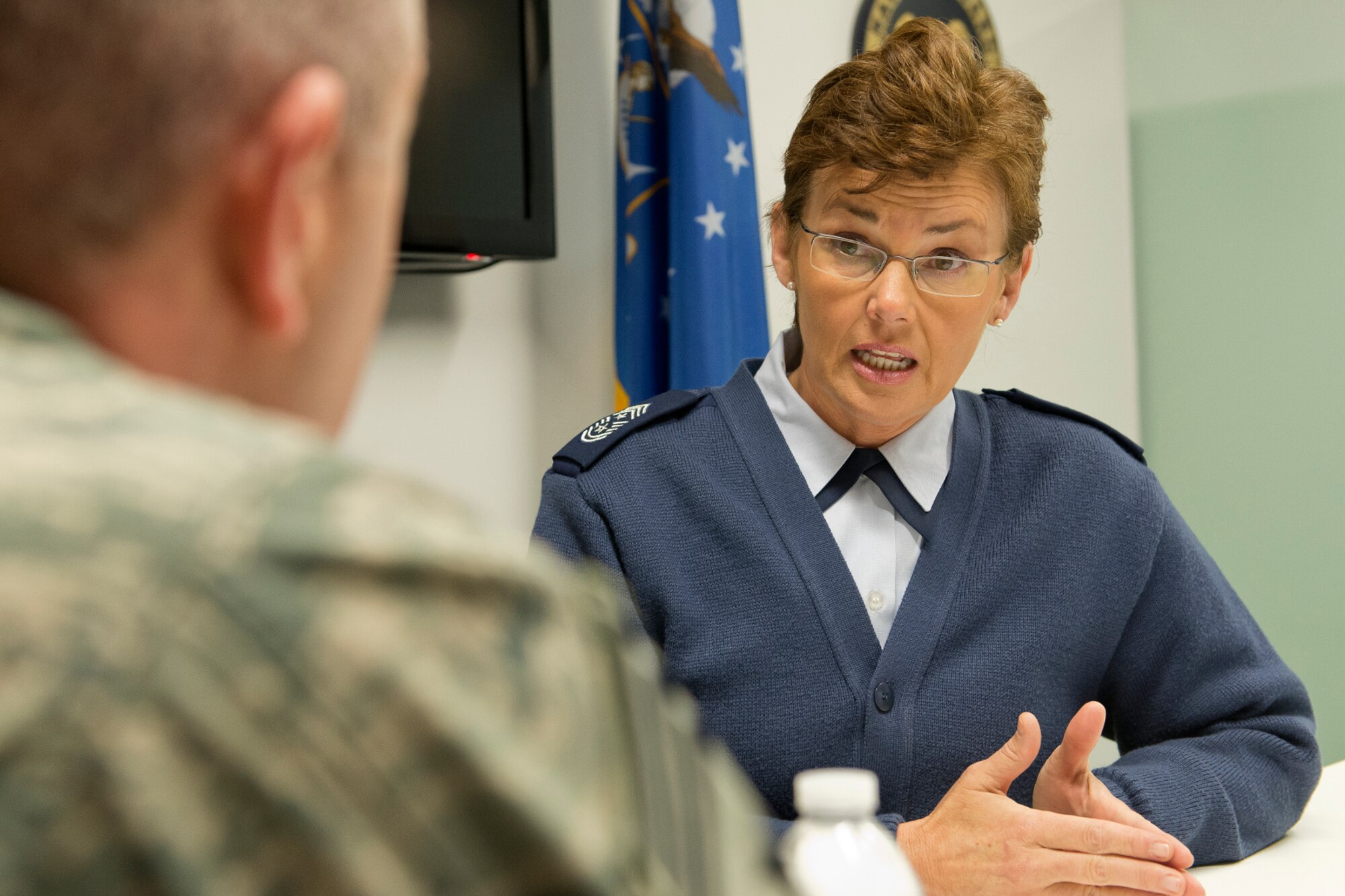 Chief Master Sgt. Victoria Gamble, command chief master sergeant for 18th Air Force, Scott Air Force Base, Ill., visits with Chief Master Sgt. Jim Hotaling, command chief master sergeant of the Air National Guard during an office call at Joint Base Andrews, Md., Jan 7, 2014. As the command chief of 18th AF, Gamble serves as the primary adviser to the commander on matters concerning mission effectiveness, readiness, training, health welfare, and morale of personnel assigned to the command's 11 wings, the 618th Tanker Airlift Control Center, and two stand-alone groups. (U.S. Air National Guard photo by Master Sgt. Marvin R. Preston/Released)
