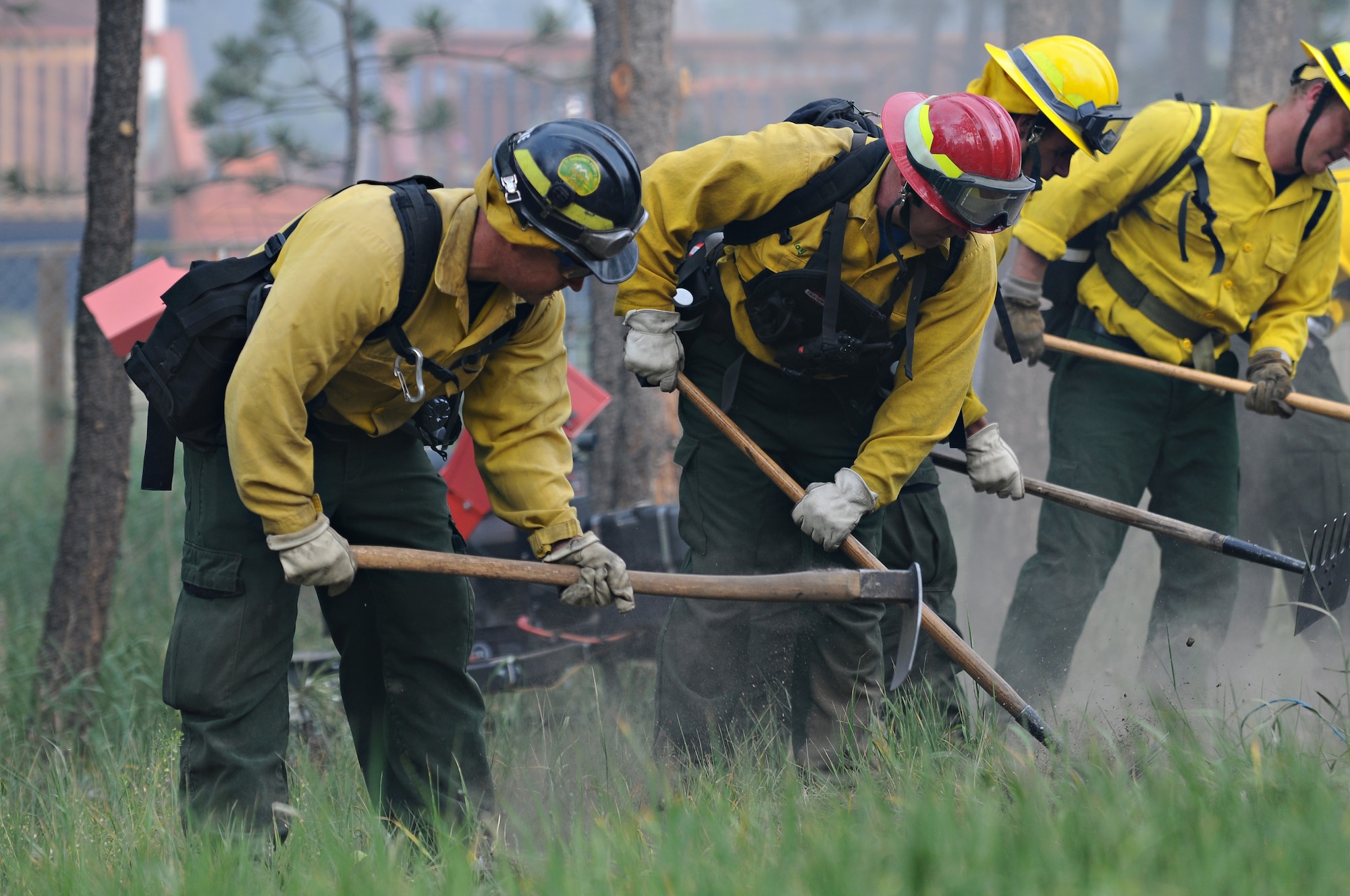 U.S. Air Force Academy firefighters team with other fire departments in El Paso County to fight the Black Forest fire in June 2013. (U.S. Air Force photo/Chris Dewitt)
