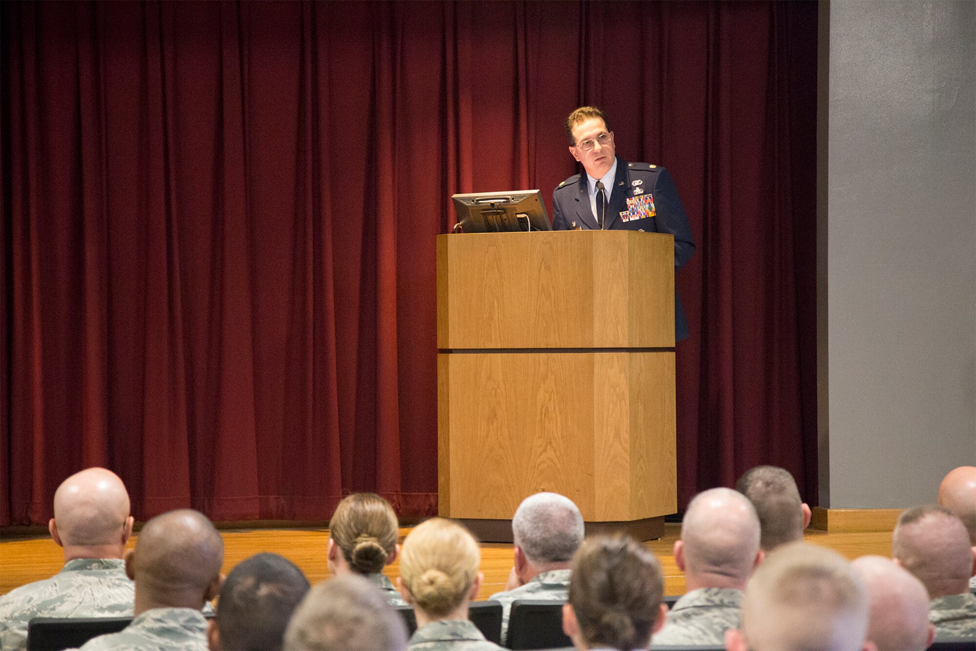 Maj. Bruno Gaita, 105th Security Forces Squadron commander, speaks about Staff Sgt. Todd Lobraico Jr., a defender who was killed in action in Afghanistan, during a dedication ceremony at the 343rd Training Squadron. The ceremony was held to honor Lobraico’s sacrifice and add his photo to the Security Forces Memorial Wall.. (U.S Air Force Photo/Joshua Rodriguez)