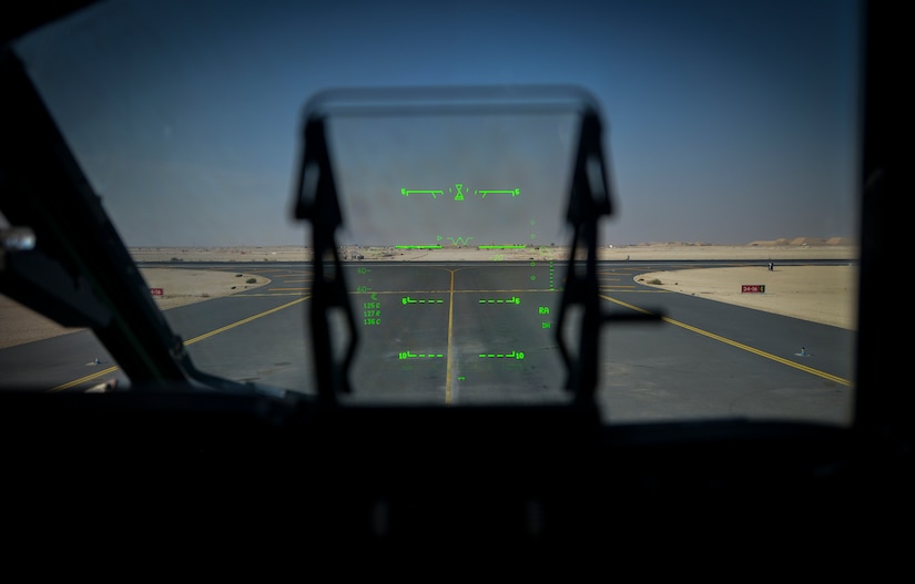 The view from a head up display of a C-17 Globemaster III , which sits on a flightline at Al Udeid Air Base, Qatar, Jan. 9, 2014. The C-17 is assigned to the 816th Expeditionary Airlift Squadron which is responsible for providing strategic airlift and combat operations to the U.S. Air Forces Central Command’s area of responsibility. The Airmen assigned to the 816th EAS, who are deployed from Joint Base Charleston, S.C., have flown more than130 sorties, moved more than 4 million pounds of cargo and more than 1,700 passengers in the past two weeks alone. (U.S. Air Force photo/Senior Airman Jared Trimarchi) 