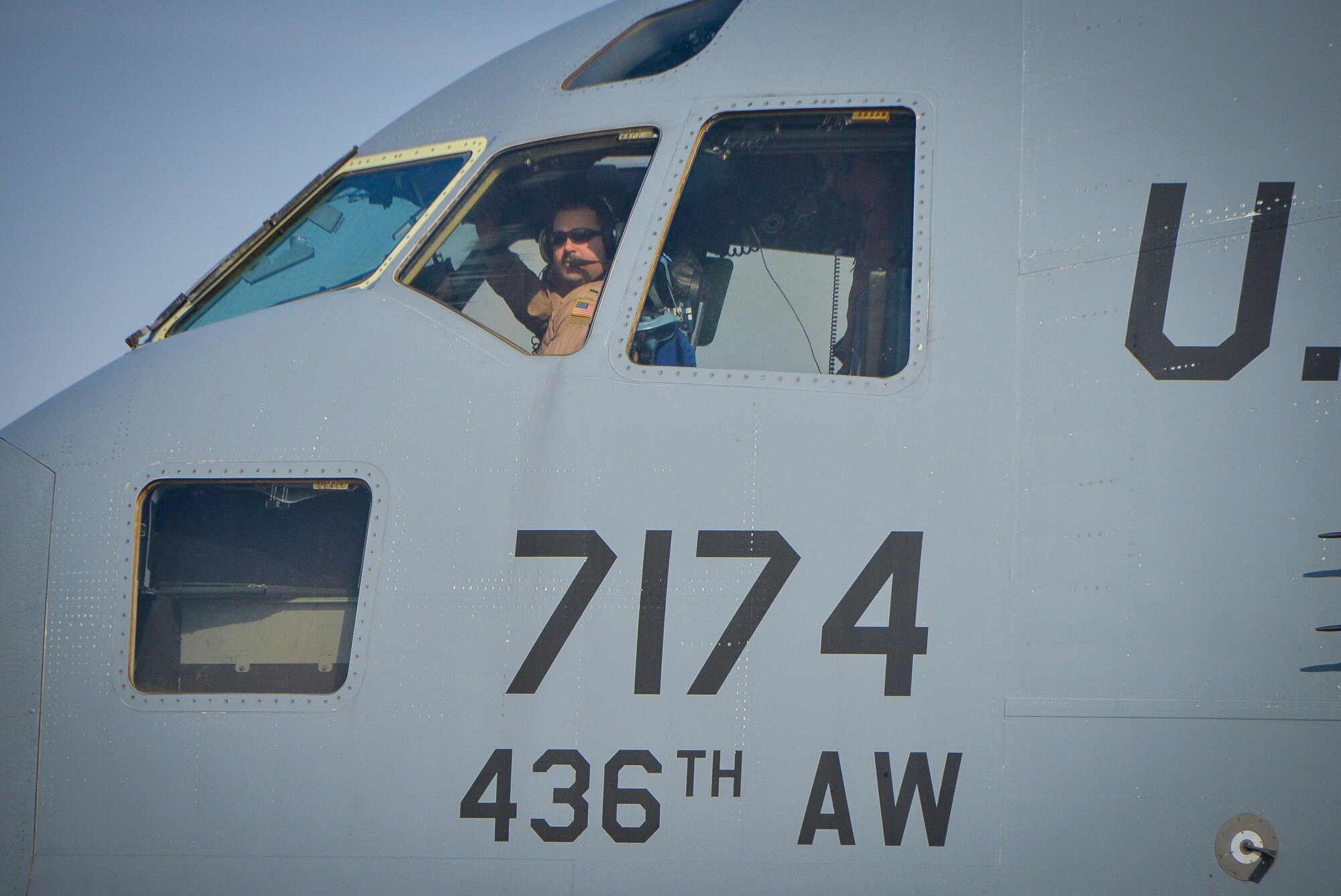 1st Lt. Zach White inspects the runway aboard a C-17 Globemaster III at Al Udeid Air Base, Qatar, Jan. 9, 2014. The 816th EAS is responsible for providing strategic airlift and combat operations to the U.S. Air Forces Central Command’s area of responsibility. The Airmen assigned to the 816th EAS, who are deployed from Joint Base Charleston, S.C., have flown more than130 sorties, moved more than 4 million pounds of cargo and more than 1,700 passengers in the past two weeks alone. White is a pilot who hails from Bethel, Conn. (U.S. Air Force photo/Senior Airman Jared Trimarchi) 