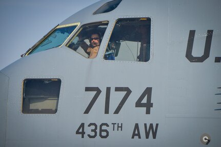 1st Lt. Zach White inspects the runway aboard a C-17 Globemaster III at Al Udeid Air Base, Qatar, Jan. 9, 2014. The 816th EAS is responsible for providing strategic airlift and combat operations to the U.S. Air Forces Central Command’s area of responsibility. The Airmen assigned to the 816th EAS, who are deployed from Joint Base Charleston, S.C., have flown more than130 sorties, moved more than 4 million pounds of cargo and more than 1,700 passengers in the past two weeks alone. White is a pilot who hails from Bethel, Conn. (U.S. Air Force photo/Senior Airman Jared Trimarchi) 