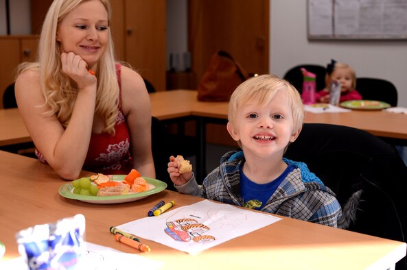 SPANGDAHLEM AIR BASE, Germany – Asher, 2-years-old, came with his mother, Jeanne Tubman, to the 52nd Force Support Squadron Airman & Family Readiness Center Jan. 10, 2014. The community coffee break was child-friendly and welcomed anyone from Spangdahlem. (U.S. Air Force photo by Airman 1st Class Kyle Gese/Released)