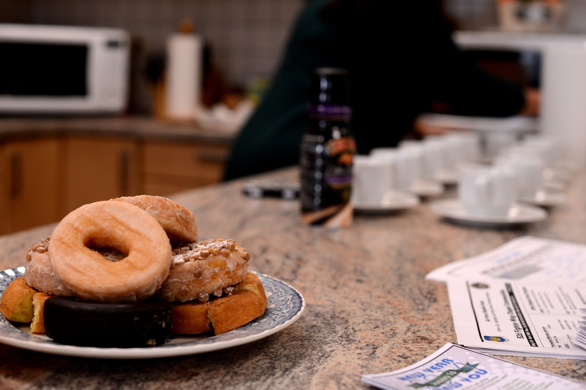 SPANGDAHLEM AIR BASE, Germany – Coffee and donuts were available during a community coffee break at the 52nd Force Support Squadron Airman & Family Readiness Center Jan. 10, 2014. The coffee break gave an opportunity for people to become familiar with local events and ask questions about current topics. (U.S. Air Force photo by Airman 1st Class Kyle Gese/Released)