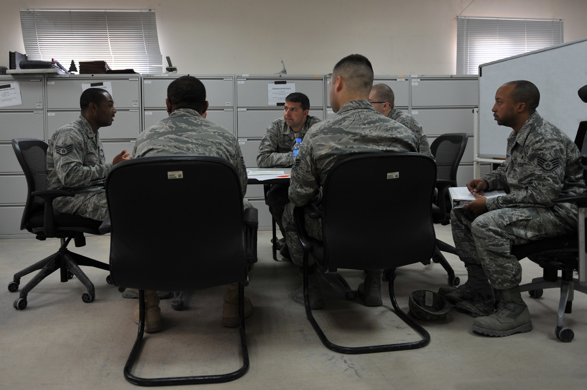 Staff Sgt. Xaviour Campbell, a 379th Expeditionary Logistics Readiness Squadron lease vehicle management journeyman, provides vehicle control officer training to newly appointed VCOs at Al Udeid Air Base, Qatar, Jan. 8, 2014. Vehicle control officers are appointed by unit commanders to be the focal point concerning assets and acts as the liaison between the unit and vehicle management. Campbell is deployed from RAF Mildenhall, England and an Ochorios, Jamaica native. (U.S. Air Force photo by Master Sgt. David Miller)