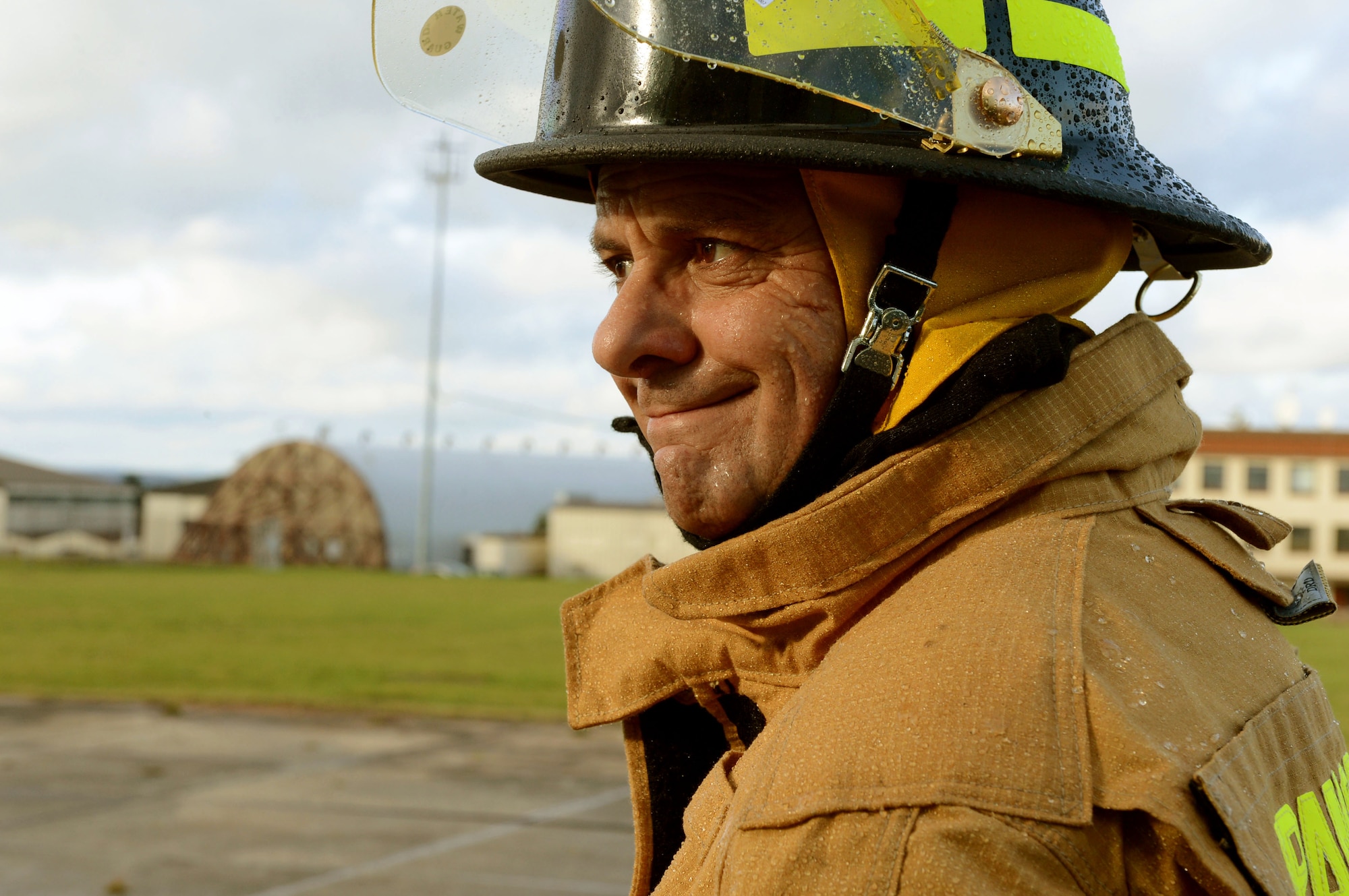 SPANGDAHLEM AIR BASE, Germany – Klaus Schmitt, 52nd Civil Engineer Squadron fire protection, attends a live-fire training exercise on the burn pad Jan. 8, 2014. Spangdahlem firefighters are required to attend qualification training to remain proficient in fighting fires and saving lives. (U.S. Air Force photo by Airman 1st Class Kyle Gese/Released)