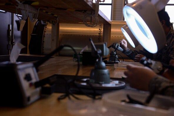 SPANGDAHLEM AIR BASE, Germany -- Students assigned to 372nd Training Squadron Detachment 17 learn how to solder during a basic soldering course Jan. 8, 2014. The detachment offers the course to all Airmen and not just those in maintenance career fields. (U.S. Air Force photo by Senior Airman Rusty Frank/Released)