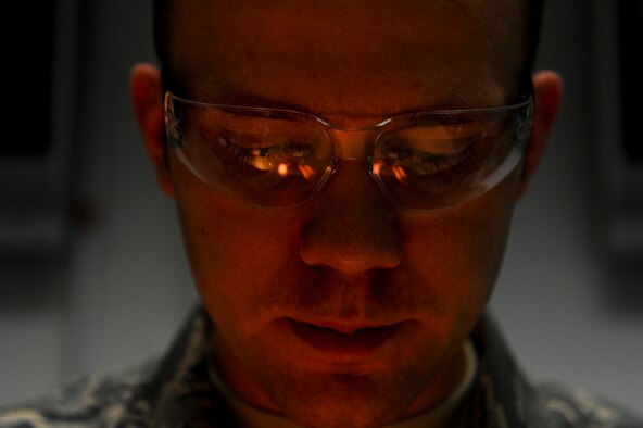 SPANGDAHLEM AIR BASE, Germany -- U.S. Air Force Staff Sgt. Will Robinson, a 372nd Training Squadron Detachment 17 miniature and micro-miniature module test and repair instructor from Great Falls, Mont., runs through a demo during a 2M class Jan. 7, 2013. Robinson works with 11 other instructors at the detachment. (U.S. Air Force photo by Senior Airman Rusty Frank/Released)