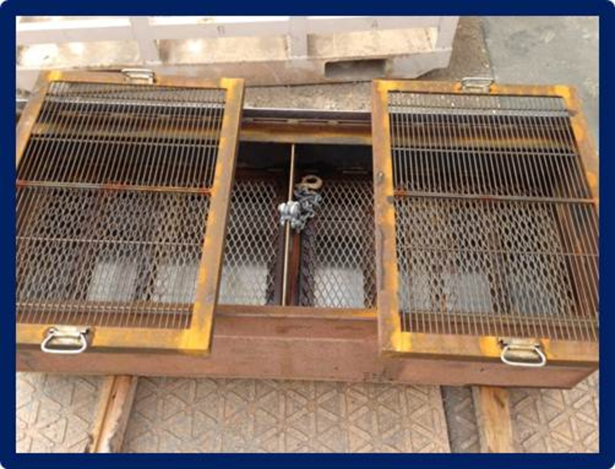 Members of the Top Three and 16 volunteer Airmen took initiative to refurbish a grill at Memorial Plaza at Al Udeid Air Base, Qatar, Dec. 23, 2013, as a part of the 2013 Legacy Project. The project began on Dec 25, 2013 and was completed in five days total time. The Top Three is a professional organization that fosters the AUAB community through the interaction and camaraderie of its members.  The group promotes morale, esprit de corps and professional development, through volunteer opportunities, award programs, professional development seminars and encourage Airmen to take ownership and leave AUAB better then they found it. (U.S. Air Force photo/Tech. Sgt. Damian Davies)