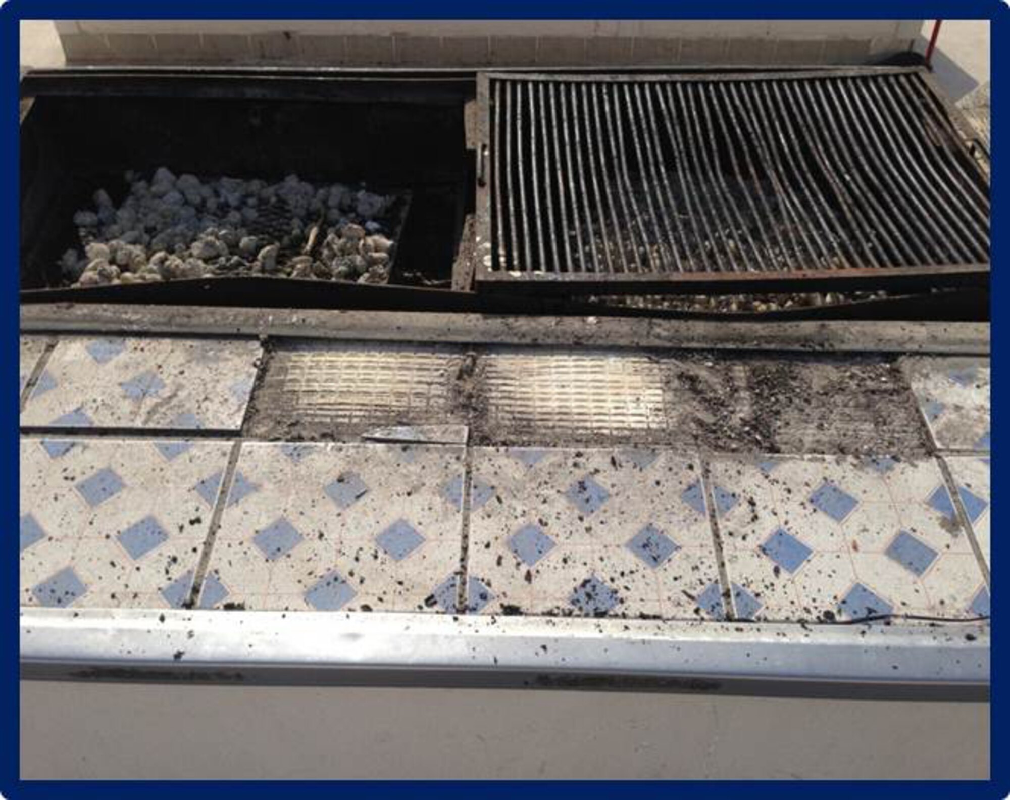 Members of the Top Three and 16 volunteer Airmen took initiative to refurbish a grill at Memorial Plaza at Al Udeid Air Base, Qatar, Dec. 23, 2013, as a part of the 2013 Legacy Project. The project began on Dec 25, 2013 and was completed in five days total time. The Top Three is a professional organization that fosters the AUAB community through the interaction and camaraderie of its members.  The group promotes morale, esprit de corps and professional development, through volunteer opportunities, award programs, professional development seminars and encourage Airmen to take ownership and leave AUAB better then they found it. (U.S. Air Force photo/Tech. Sgt. Damian Davies)