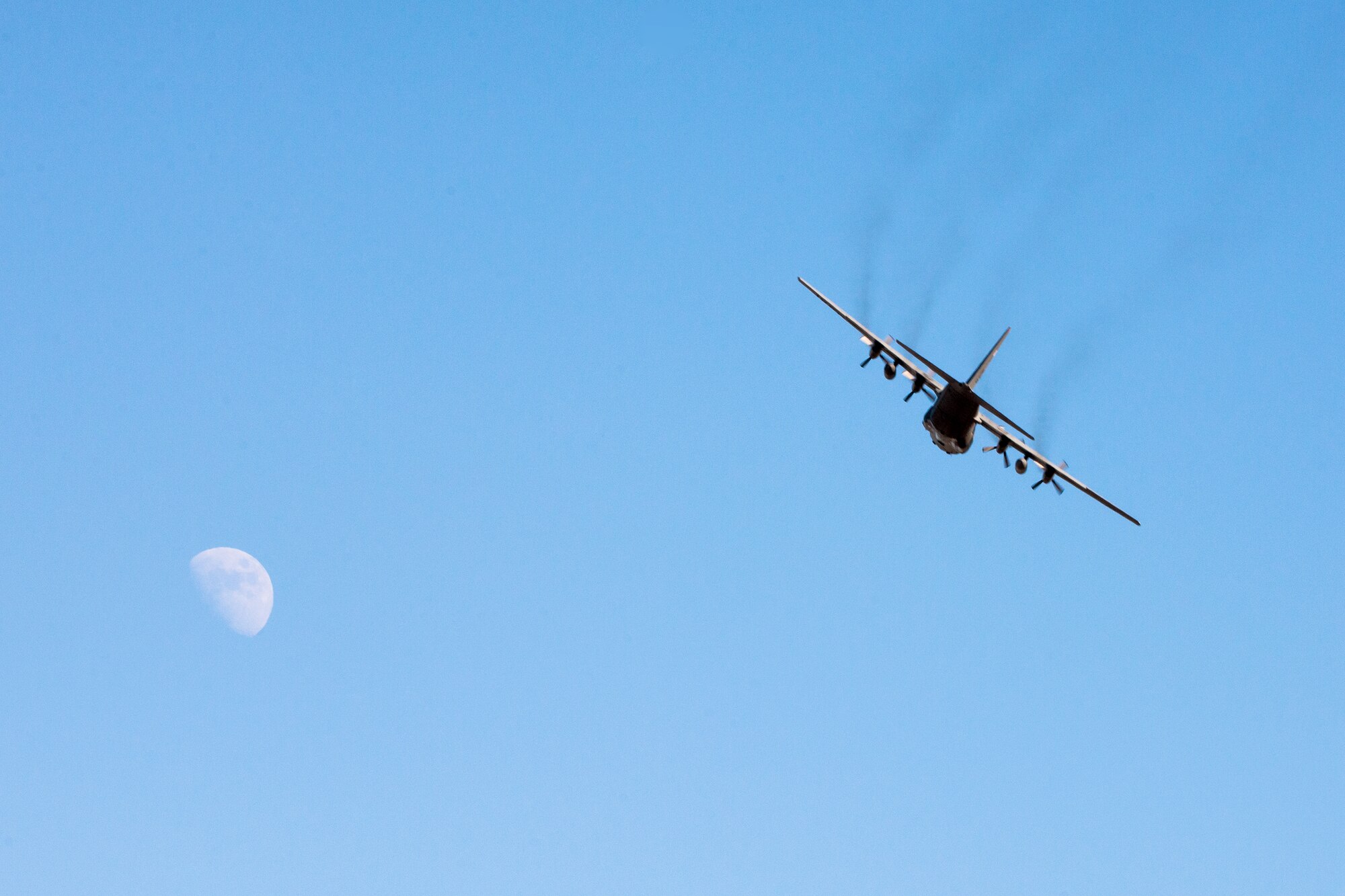 A C-130 Hercules with the 36th Airlift Squadron flies over Yokota Air Base, Japan, during a routine sortie Jan. 9, 2014. After completing missions in Bangladesh, Philippines and Guam, the 36 AS regularly conducts training missions to remain proficient in the necessary skills to support any contingency. (U.S. Air Force photo by Osakabe Yasuo/RELEASED)