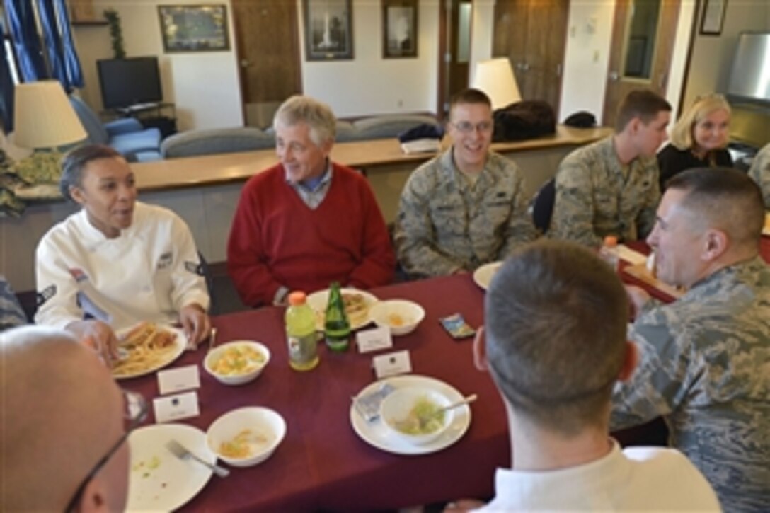 Defense Secretary Chuck Hagel, center left, has lunch with members of the 319th Missile Squadron as he visits the E-01 Missile Alert Facility and Launch Control Center near Cheyenne, Wyo., Jan. 9, 2014. 