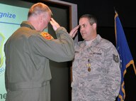 Tech. Sgt. James R. Emerich, 442nd Fighter Wing Commanders Support Staff, receives the Air Force Commendation Medal from 442nd FW vice-commander Col. Gregory Eckfeld, here, on Jan. 11, 2014. The Air Force Commendation Medal is presented for sustained acts of heroism or meritorious service. The 442nd Fighter Wing is an A-10 Thunderbolt II Air Force Reserve unit at Whiteman Air Force Base, Mo. (U.S. Air Force Photo/Staff Sgt. Wesley Wright)