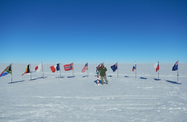 A picture of U.S. Air Force Tech. Sgt. Greg Mascaro posing for a photo at the South Pole.