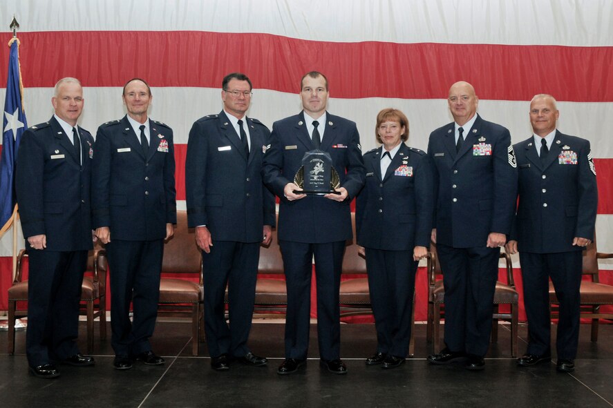 Airman 1st Class Tag Noel is awarded the 2013 Airman of the Year award at the Annual Awards Ceremony held in the hangar of the 132nd Fighter Wing, Des Moines, Iowa on Saturday, November 2, 2013.  (U.S. Air National Guard photo by Staff Sgt. Linda K. Burger/Released)