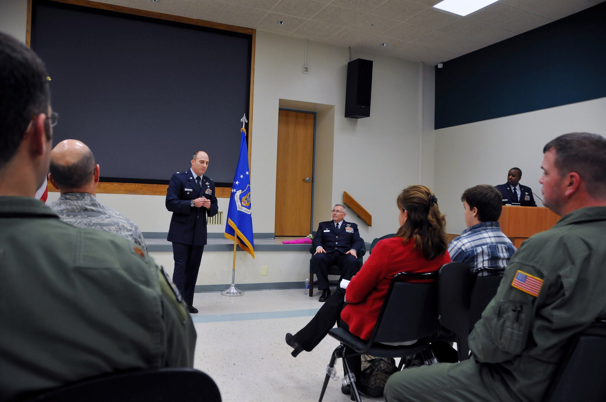 Lt. Col. Thomas Guerra, incoming 326th Aerial Port Squadron commander, addresses Liberty Wing airmen during his assumption of command ceremony, Jan. 11, 2014, Dover Air Force Base, Del. Guerra quoted 28th U.S. Secretary of War Gen. John M. Schofield's famous address to the 1879 West Point graduates as he spoke of respect and leadersip. (U.S. Air Force photo/Senior Airman Erika Brooke) 