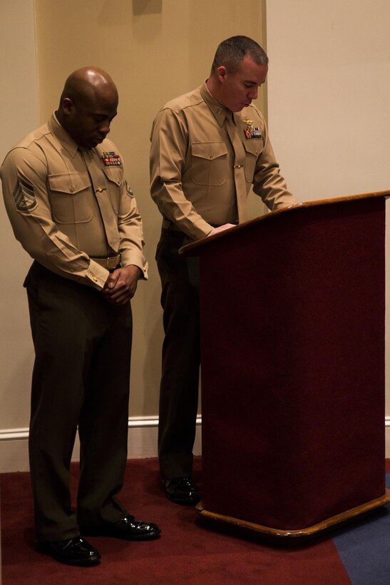 Navy Lt. James Dewey, Marine Barracks Washington, D.C. chaplain, gives the invocation during the graduation of a lance corporal seminar at the Barracks Jan. 10. The four-day course featured classes taught by Barracks personnel and a graduation. (Official Marine Corps photo by Cpl. Dan Hosack/Released)