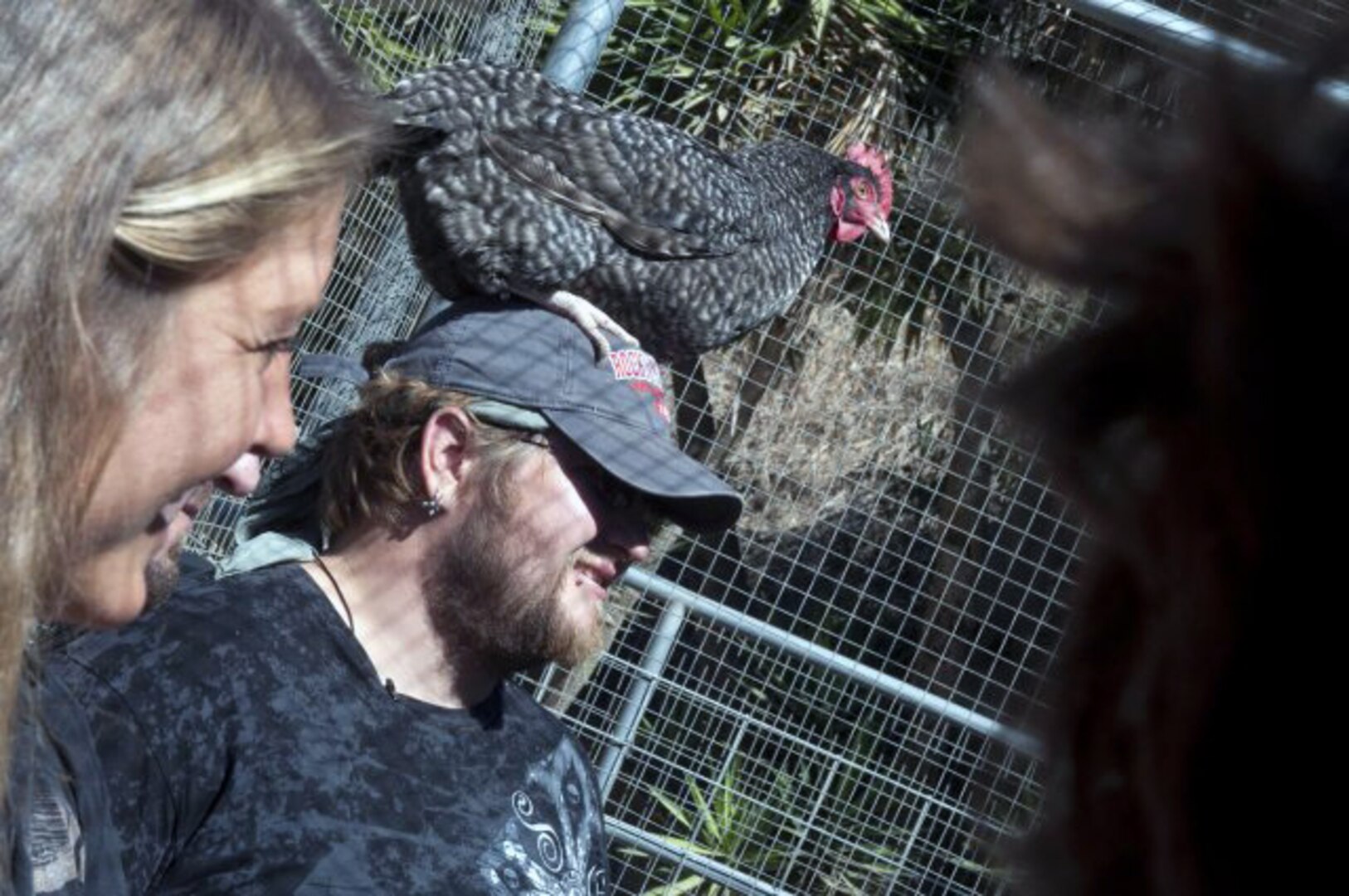 Retired Marine Cpl. Kenny Toon enjoys an animal therapy session, Nov. 6, 2013, with 11 other combat veterans participating in the Save A Warrior program in Malibu, Calif. The program was designed by retired California Army National Guard Capt. Jake Clark, to assist veterans experiencing post-traumatic stress.