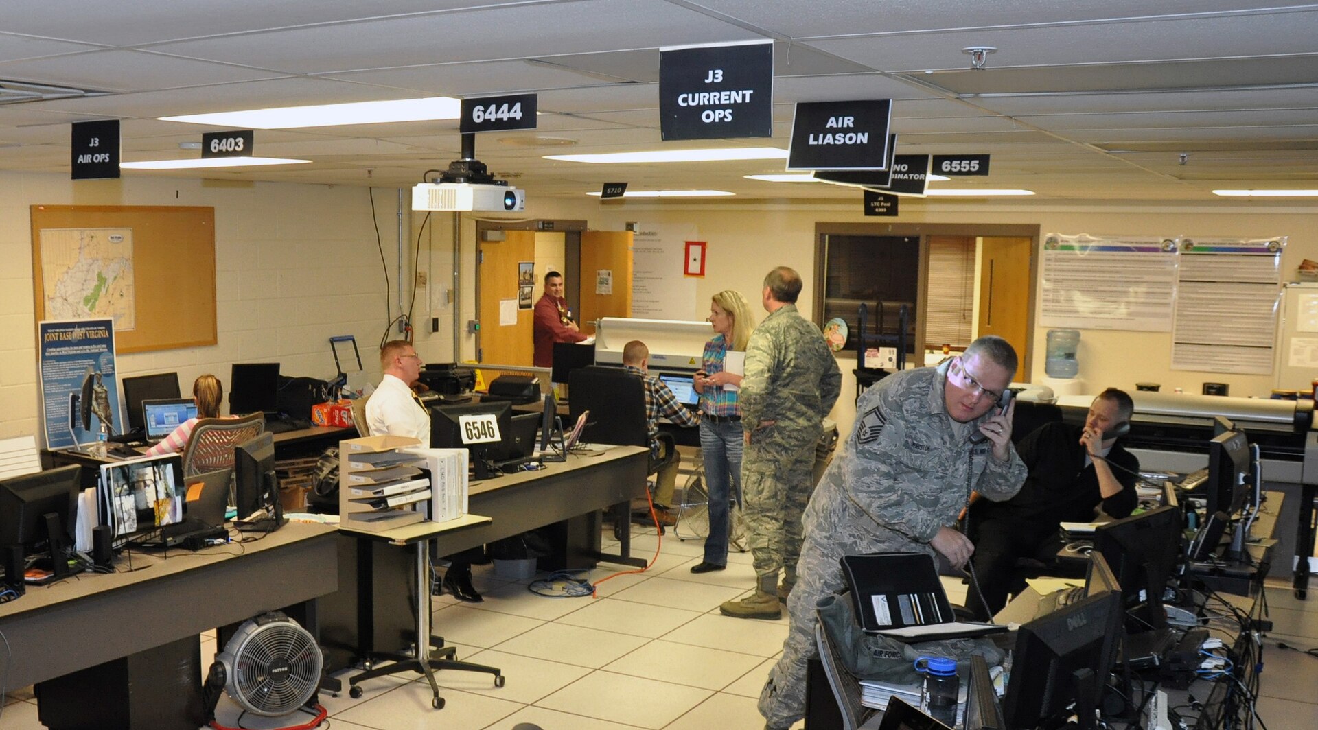 Members of the West Virginia National Guard in action Jan. 9, 2014, assisting in a clean water emergency.