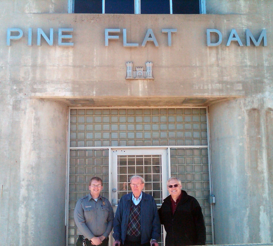 Stanley Vendlinski, age 93, one of the engineers who helped construct Pine Flat Dam near Sanger, Calif., some 60 years ago, revisits the project on Dec. 23, 2013. From left to right are Zack Montreuil, Pine Flat park ranger; Stanley Vendlinski and Terry Vendlinski, the engineer’s son. “He was always very proud of Pine Flat Dam and always talked about it as we were growing up,” said the younger Vendlinski. “Pine Flat Dam was probably one of his favorite projects he ever worked on.”