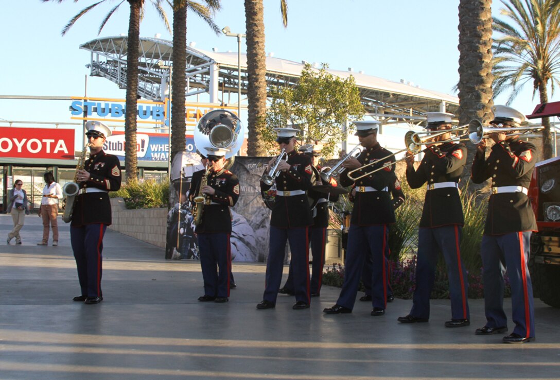 The Marine Band Sand Diego Party Band performs during the fan fest before the Semper Fidelis All-American Bowl at The StubHub Center in Carson, Calif., Jan. 5, 2014. Local Marines from the reserve center and recruiting district set up vehicles and booths for the bowl attendees to learn more about the Marine Corps and be entertained before the start of the game. The Semper Fidelis Football Program brought together over 90 of the best high-school football players in an East versus West game and is an opportunity for the Marine Corps to connect on a personal and local level with players and influencers, demonstrates commitment to developing quality citizens, and reinforces how core values of honor, courage and commitment relate to success on and off the field. (Official U.S. Marine Corps photo by Sgt. Dwight A. Henderson/Released)