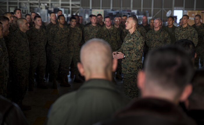 Col. Hunter H. Hobson, commanding officer of Marine Aircraft Group 12, speaks to Marines with Marine Fighter Attack Squadron 112, known as the “Cowboys,” on a job well done while aboard Marine Corps Air Station, Iwakuni, Japan, Jan. 8, 2014. The squadron has been activated for nine months on a Unit Deployment Program instead of the usual six. They spent three months in Hawaii to receive pre-deployment training prior to being station at MCAS Iwakuni.