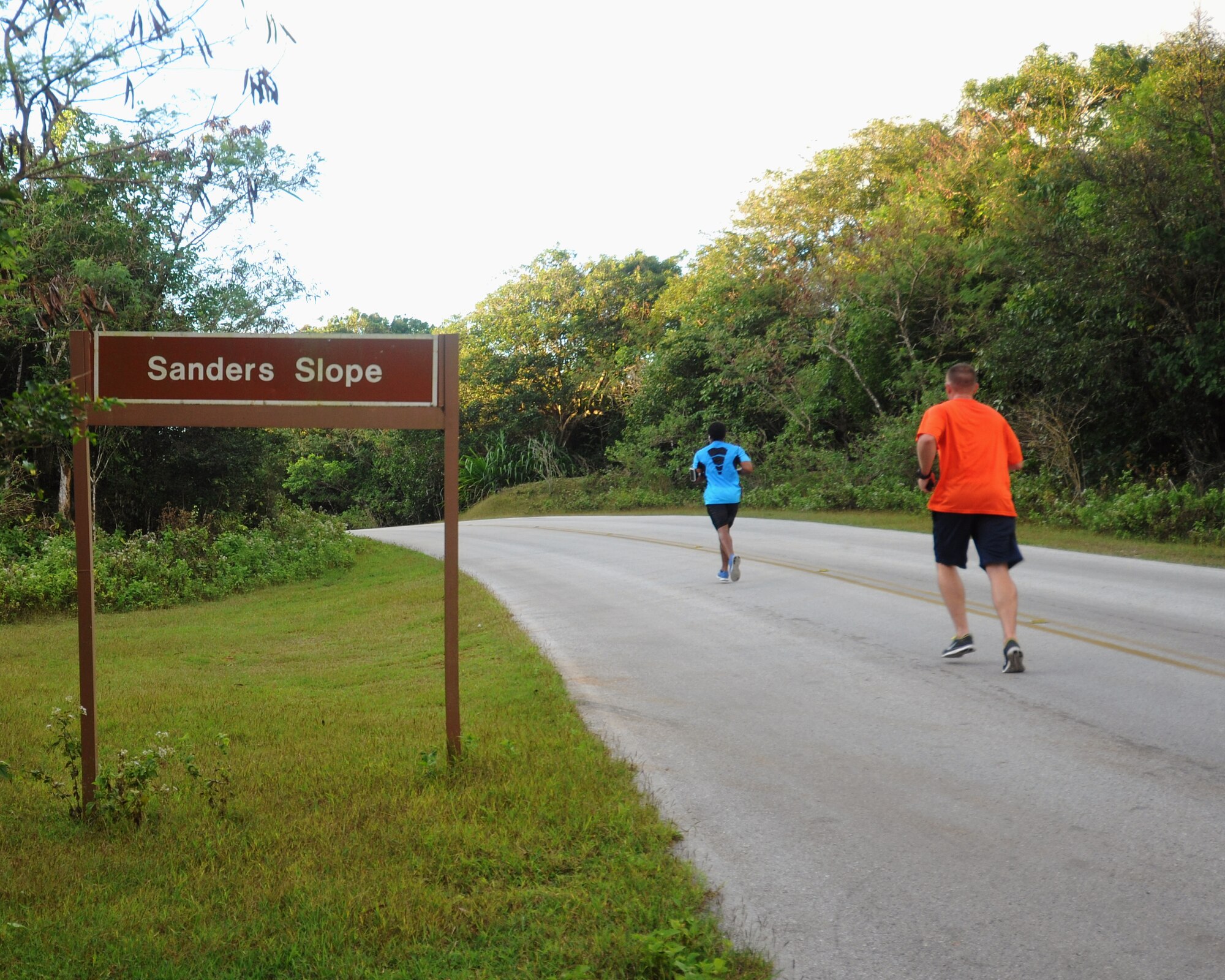 Members of Team Andersen participate in the Sanders Slaughter Run, Jan. 8, 2014, on Andersen Air Force Base, Guam. During the event, hosted by the 36th Force Support Squadron, participants ran a total of 4.8 miles. (U.S. Air Force photo by Senior Airman Cierra Presentado/Released)