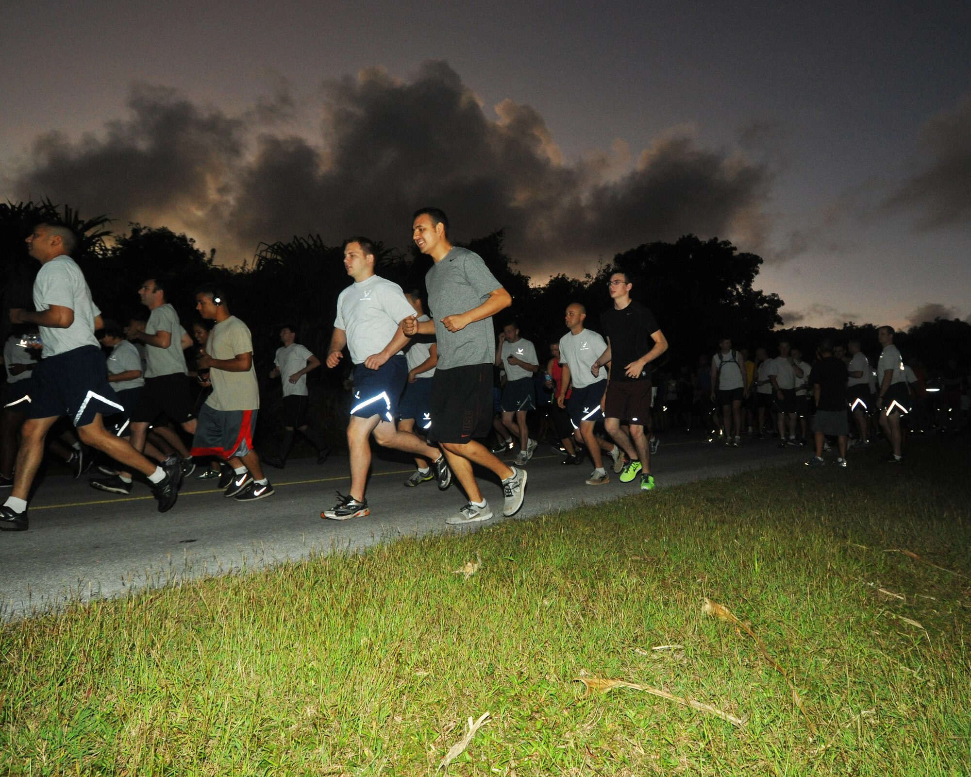 Members of Team Andersen start running in the Sanders Slaughter Run, on Andersen Air Force Base, Guam, Jan. 8, 2014. More than 250 participants ran in the base’s first group run of the year, hosted by the 36th Force Support Squadron. (U.S. Air Force photo by Senior Airman Cierra Presentado/Released)
