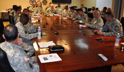 U.S. Army Col. Thomas Boccardi, Commander, Joint Task Force-Bravo, presents a command briefing to U.S. Air Force Brig. Gen. Peter E. Gersten, Deputy Director for Politico-Military Affairs (Western Hemisphere), Strategic Plans and Policy Directorate, Joint Staff, the Pentagon, Washington, D.C., at Soto Cano Air Base, Honduras, Jan. 13, 2014. Gersten met with Joint Task Force-Bravo leadership and received and in-depth look at the Task Force mission. (U.S. Air Force photo by Capt. Zach Anderson)
