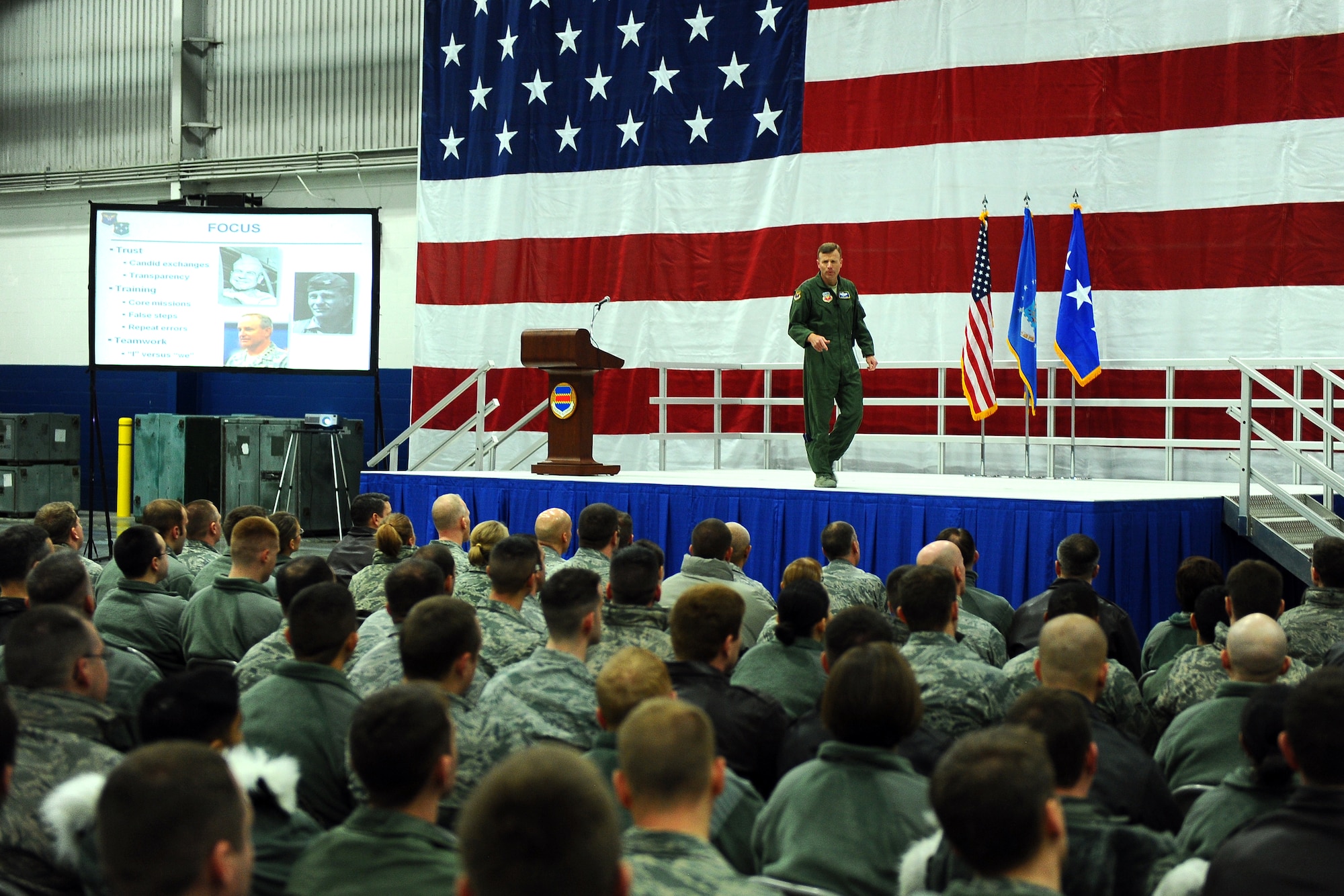 U.S. Air Force Lt. Gen. Tod D. Wolters, 12th Air Force (AFSOUTH) commander, speaks to Airmen inside of Dock 1 of the Bennie Davis Maintenance facility on Jan. 9 at Offutt Air Force Base, Neb.  Filled bleachers and floor seats left only standing room for the hundreds of Airmen attending the first visit of the 12th AF commander.  (U.S. Air Force photo by Josh Plueger/Released)
