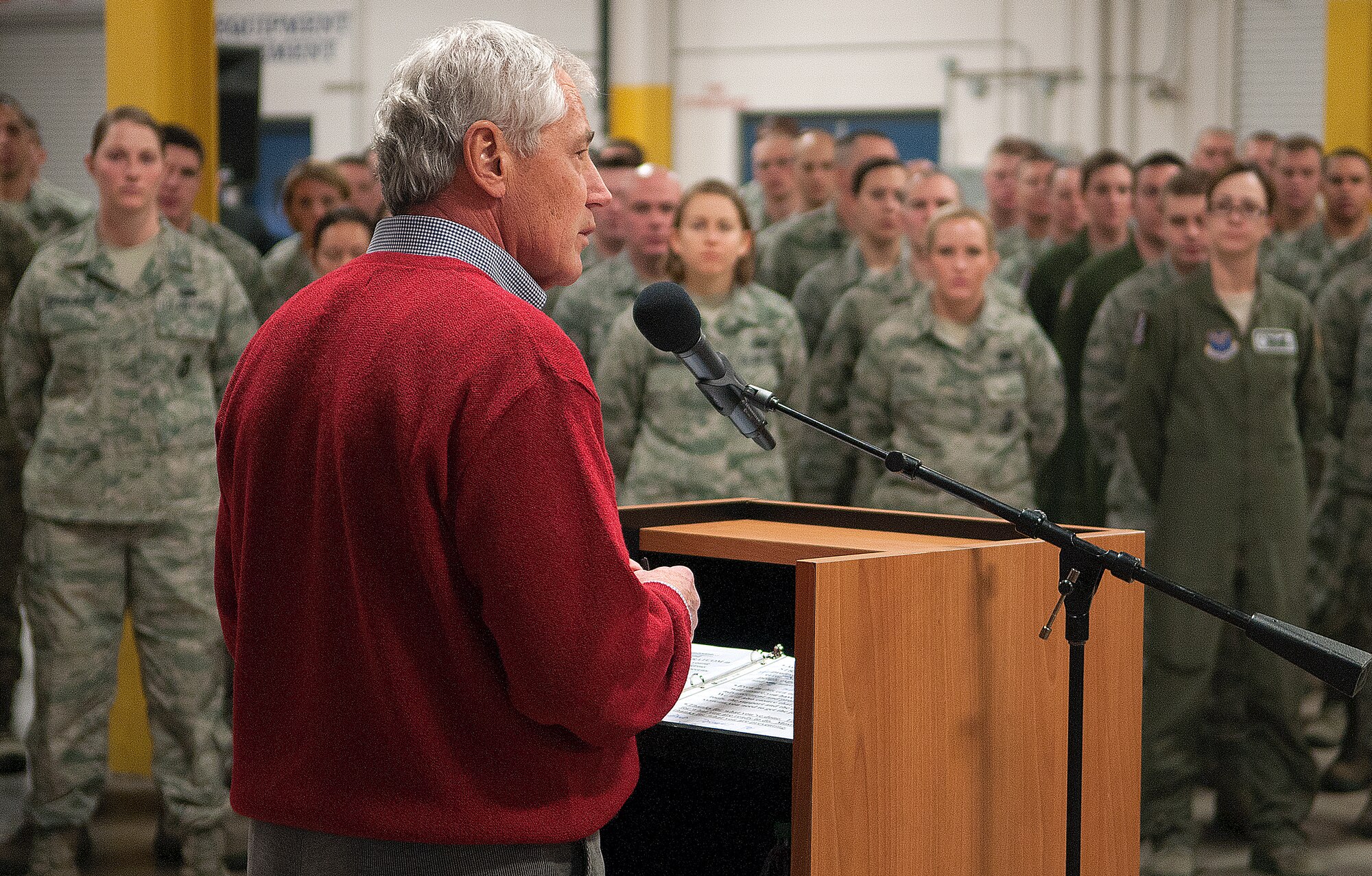 U.S. Defense Secretary Chuck Hagel addresses Airmen of the 90th Missile Wing at F.E. Warren Air Force Base, Wyo., Jan. 9, 2014. Hagel visited Warren AFB to learn about the ICBM mission and the people who operate, maintain, secure and support the Minuteman III weapon system. Hagel took time to speak to Airmen who were selected as top performers by their leadership during an Airmen’s event in the 90th Maintenance Group high bay.  (U.S. Air Force photo by R.J. Oriez)