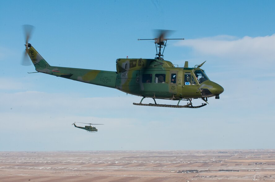 An UH-1N "Huey" helicopter from 37th Helicopter Squadron carries U.S. Defense Secretary Chuck Hagel to a missile alert facility in western Nebraska Jan. 9, 2014. Hagel visited F.E. Warren Air Force Base, Wyo., and the 90th Missile Wing to learn about the ICBM mission and the people who operate, maintain, secure and support the Minuteman III weapon system. (U.S. Air Force photo by R.J. Oriez) 