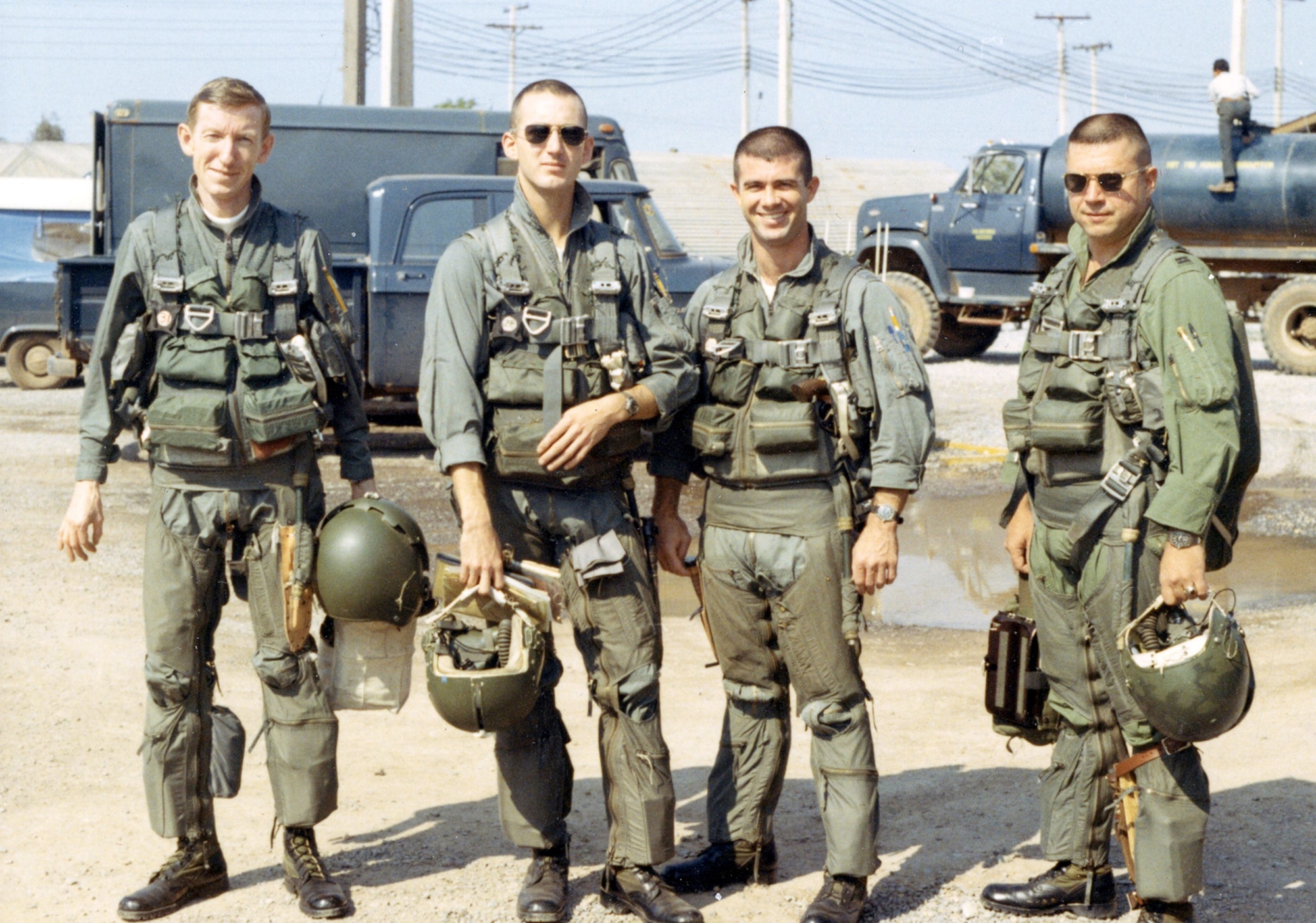 Two RF-4C aircrews fully outfitted for a mission. Unlike the single-seat RF-101C, the RF-4C carried a pilot in the front seat and a pilot/navigator in the back seat. (U.S. Air Force photo)