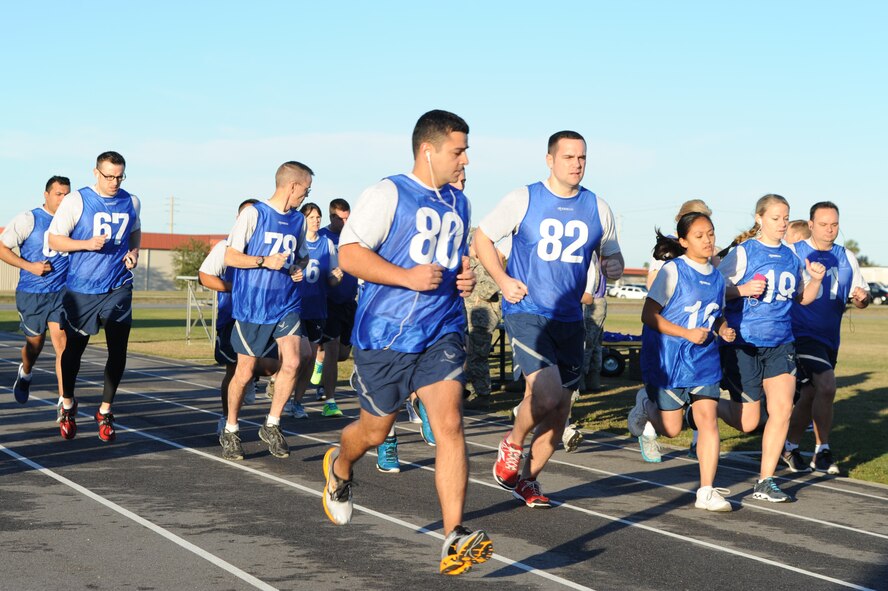 Members of the 927th Air Refueling Wing begin the running portion of their physical fitness test  Jan. 12, 2014 at MacDill Air Force Base, Fla.  The 927th ARW is a Reserve wing of more than 800 members based in Tampa, Fla.