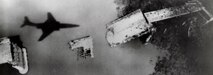 This RF-101C captured its own shadow during a low-level run over a damaged bridge in North Vietnam. (U.S. Air Force photo)