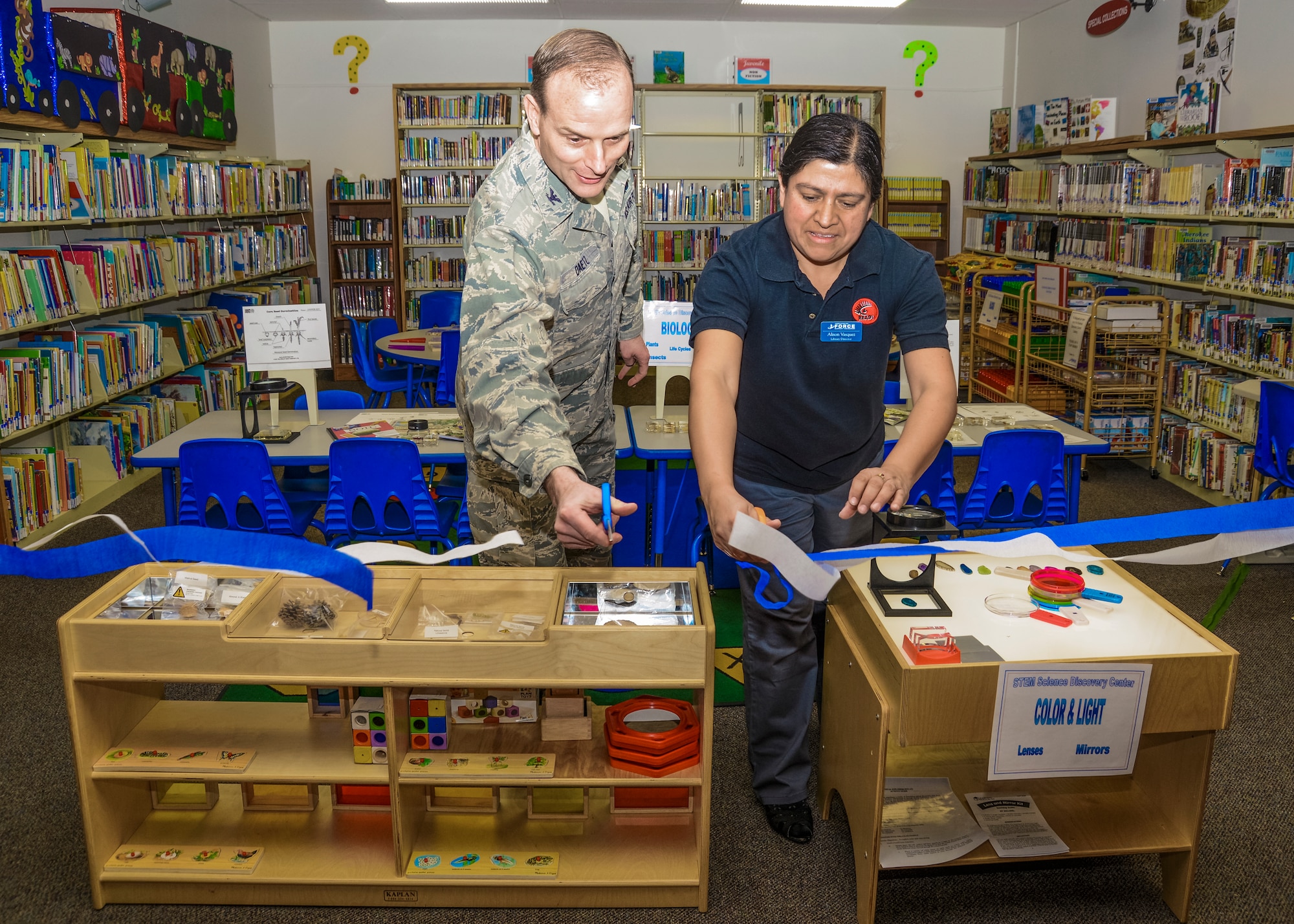 Col. Daniel Daetz, 412th Test Wing vice commander, and Alison Vasquez, the library director, cut the ceremonial ribbon to the STEM Science Discovery Center Jan. 10. (U.S. Air Force photo by Rebecca Amber)