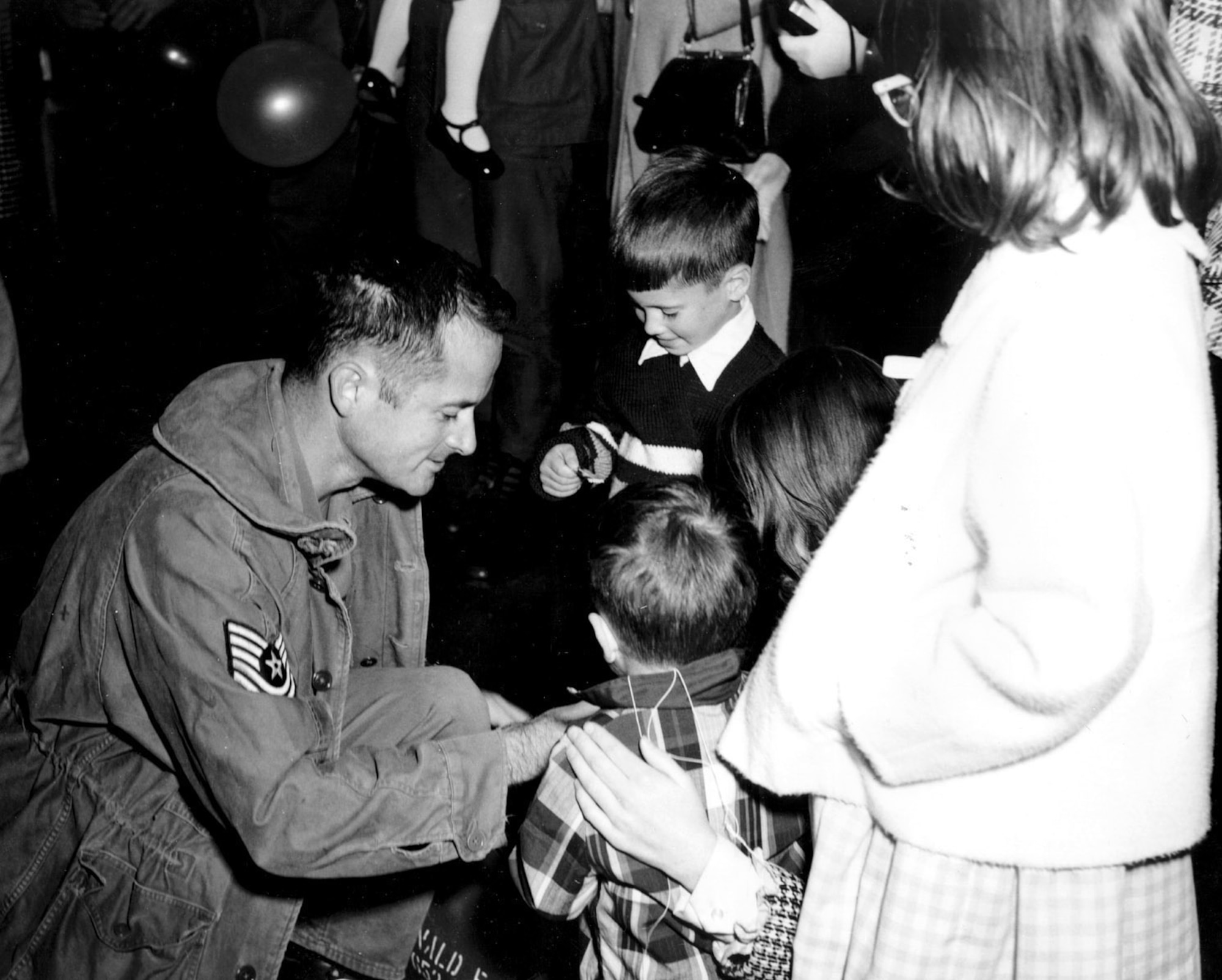 A Colorado Guardsman greets his family upon returning from South Vietnam. About 10,600 Air National Guardsmen were mobilized in 1968 -- 2,000 went to Southeast Asia (with seven killed in action), and another 4,000 served in South Korea or Japan. (U.S. Air Force Photo)