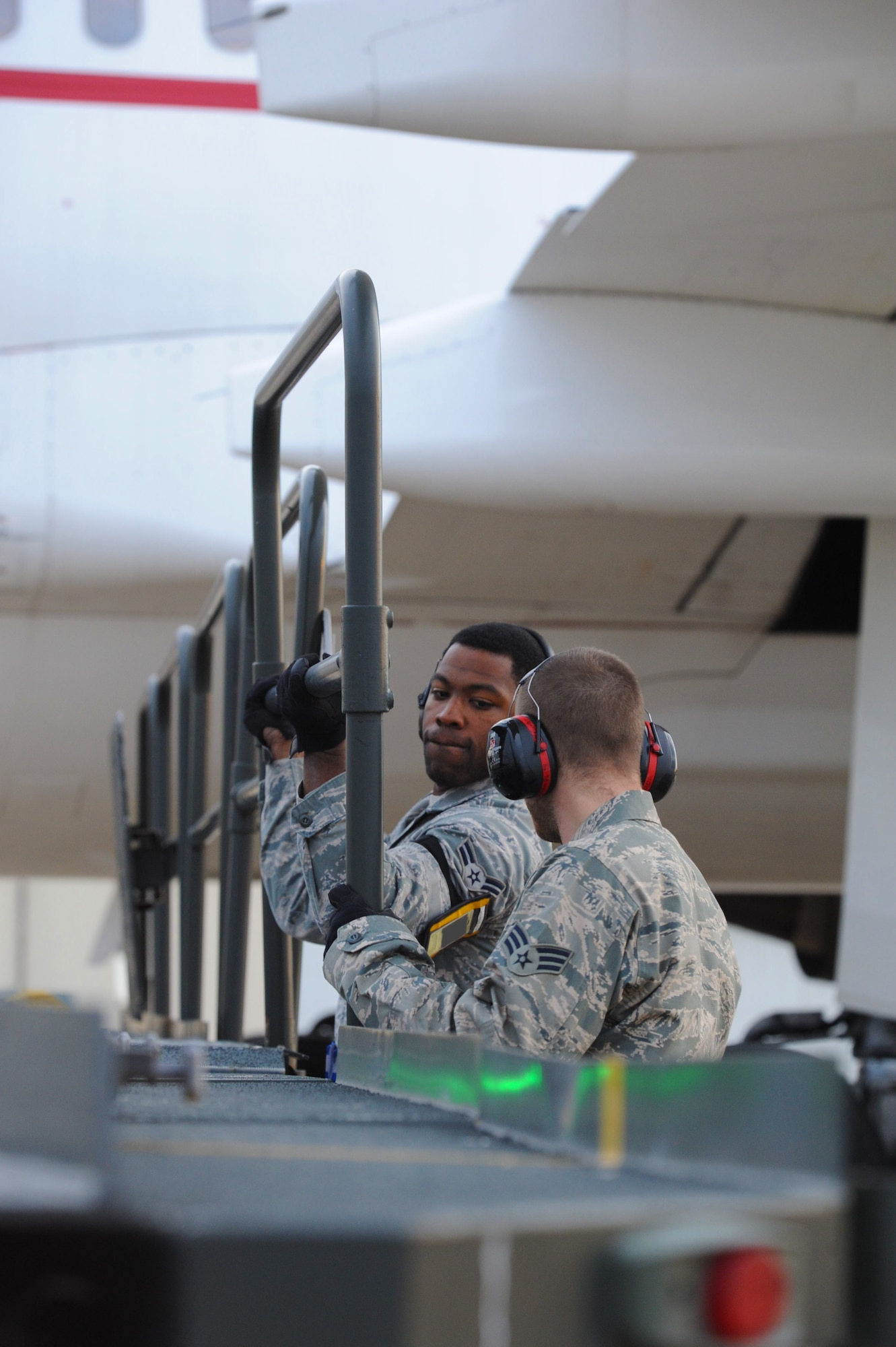 Senior Airman Vance Carter and Airman 1st Class Christen Andrews, 728th Air Mobility Squadron aircraft services, prepare a 60k loader to download cargo boxes from a French air force Airbus A310 Jan. 9, 2014, at Incirlik Air Base, Turkey. The French air force provided personnel and cargo airlift to the German military as they deployed troops to Turkey where they will assume responsibility for manning two Patriot missile batteries as part of a NATO mission to increase Turkey’s air defense capabilities against Syrian ballistic missile threats. (U.S. Air Force photo by 1st Lt. David Liapis/Released)