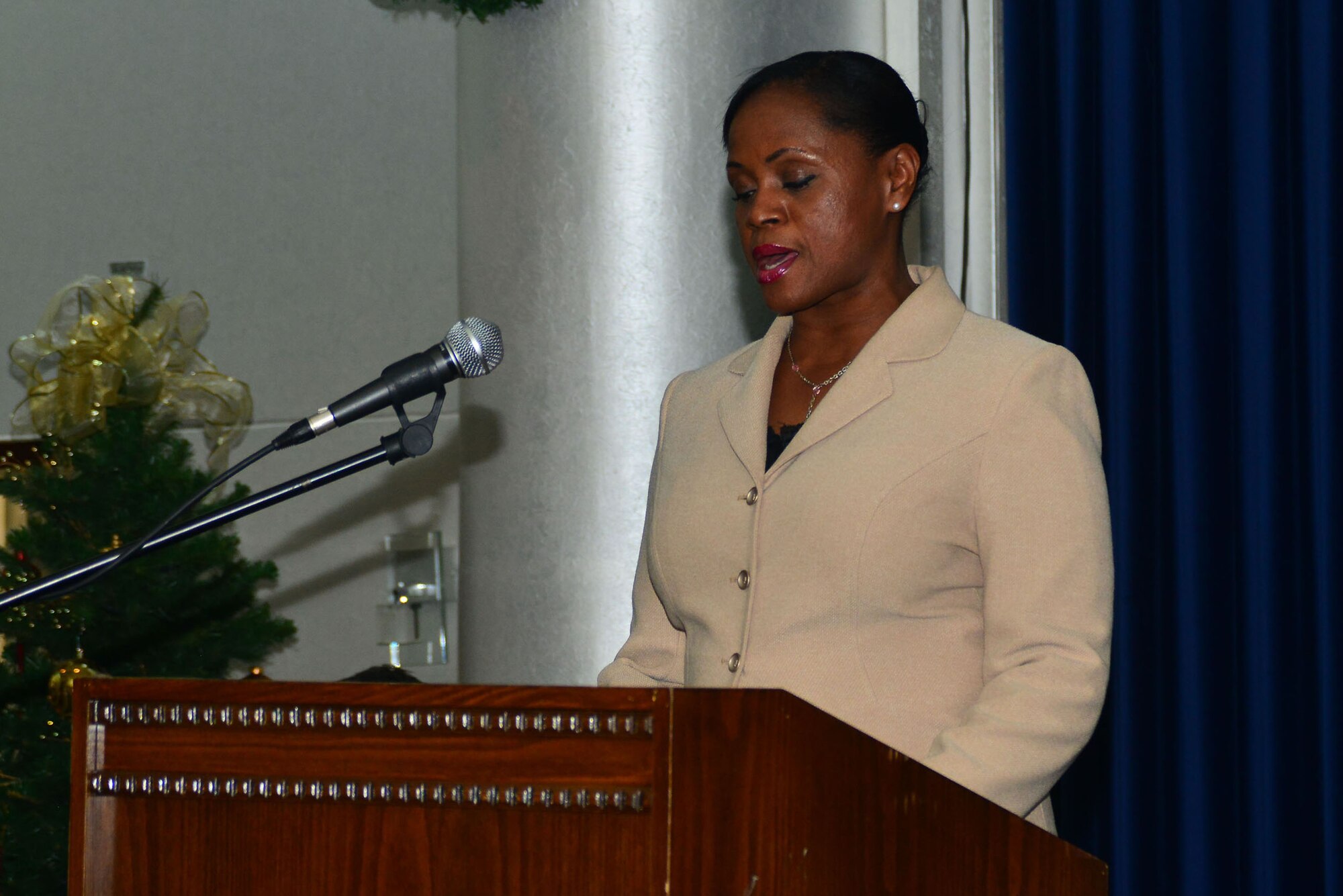 Almeda Giles, 39th Air Base Wing community support coordinator, sings the Turkish National Anthem during 2014 MLK remembrance ceremony in honor of Dr. Martin Luther King Jr. Jan. 10, 2014, at Incirlik Air Base, Turkey. More than 100 Team Incirlik members attended the event that honored the life and legacy of King. (U.S. Air Force photo by Staff Sgt. Eric Summers Jr./Released)