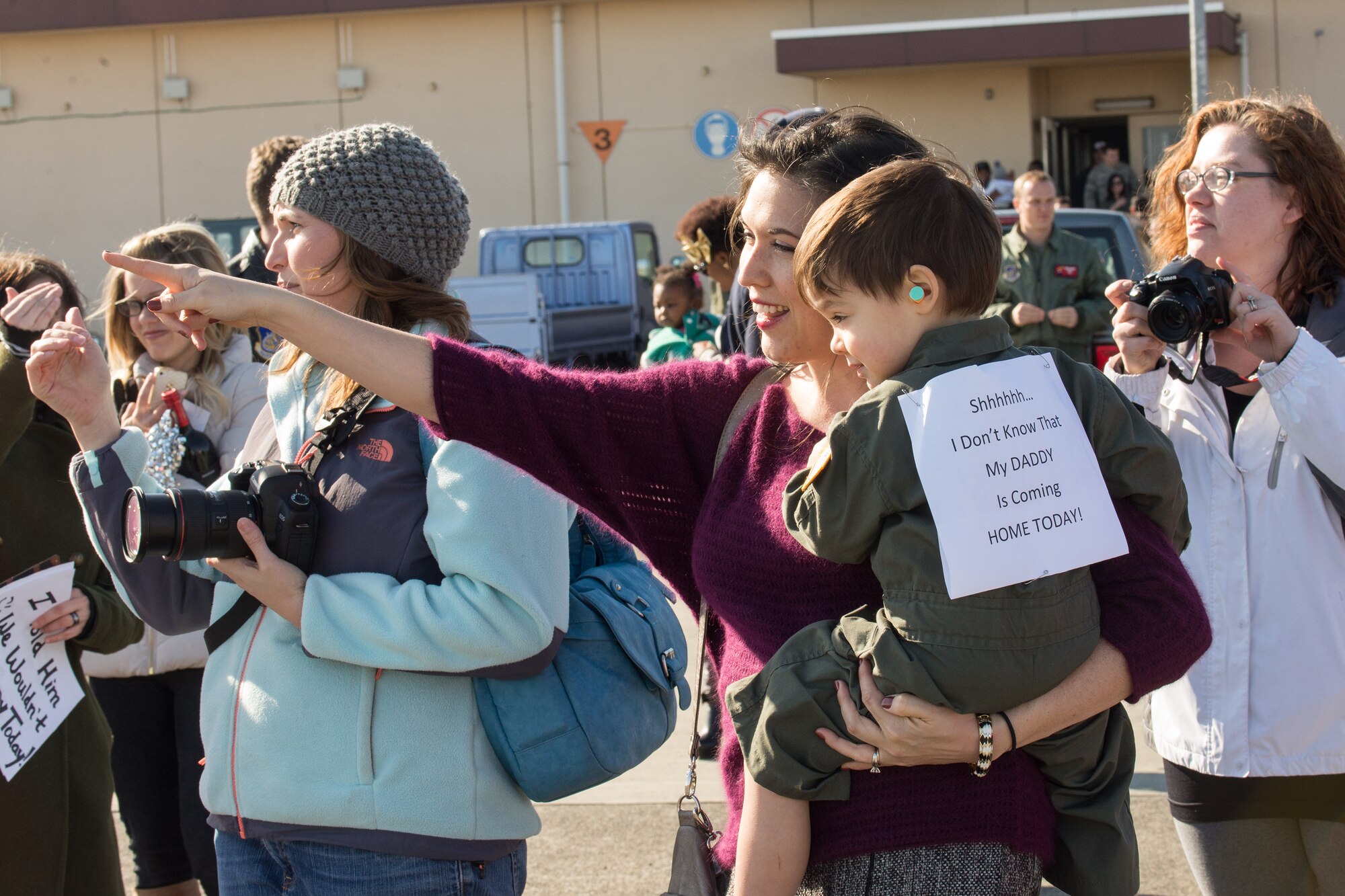 Airmen depart a C-130 Hercules at Yokota Air Base, Japan, Jan. 13, 2014 as they return from a deployment to Southwest Asia.  The Airmen returned with the aircraft which had been deployed to the same location. (U.S. Air Force photo by Osakabe Yasuo/Released)