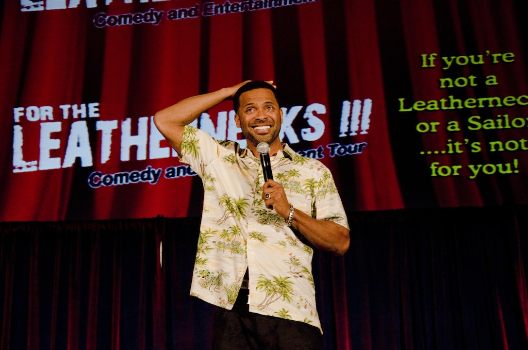 Comedian Mike Epps performs stand-up comedy during “For the Leathernecks Comedy and Entertainment Tour III,” at the base theater, Dec. 3, 2013. Epps, comedian Tom Green, rapper Big Mike and performance group Purrfect Angelz, were featured in the tour, which is sponsored by the Single Marine Program at Headquarters Marine Corps. All active-duty service members aboard MCB Hawaii were welcome to watch the performance. (U.S. Marine Corps photo by Kristen Wong) 